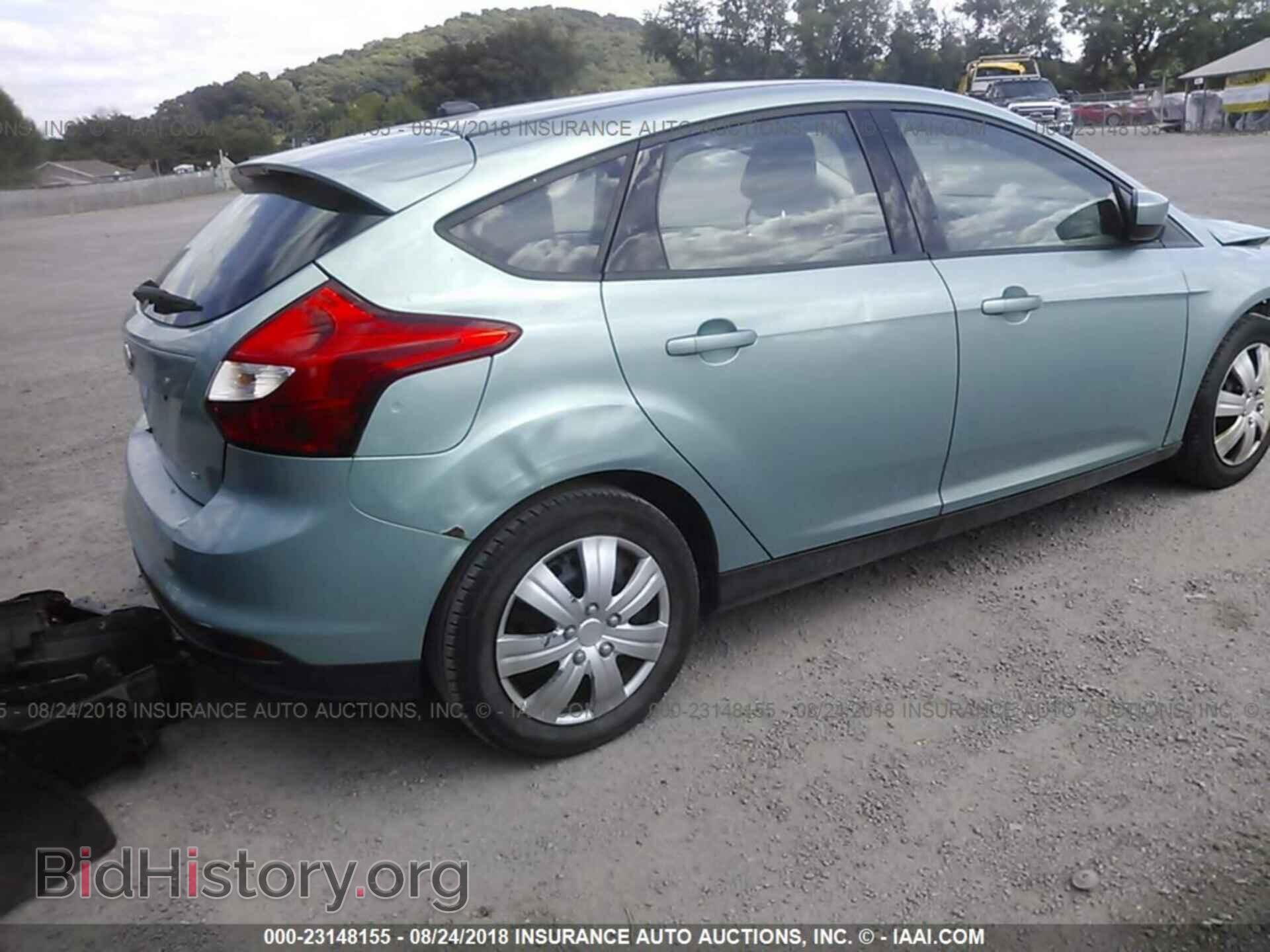 2012 Ford Focus - VIN: 1FAHP3K22CL323506 - Фото 4