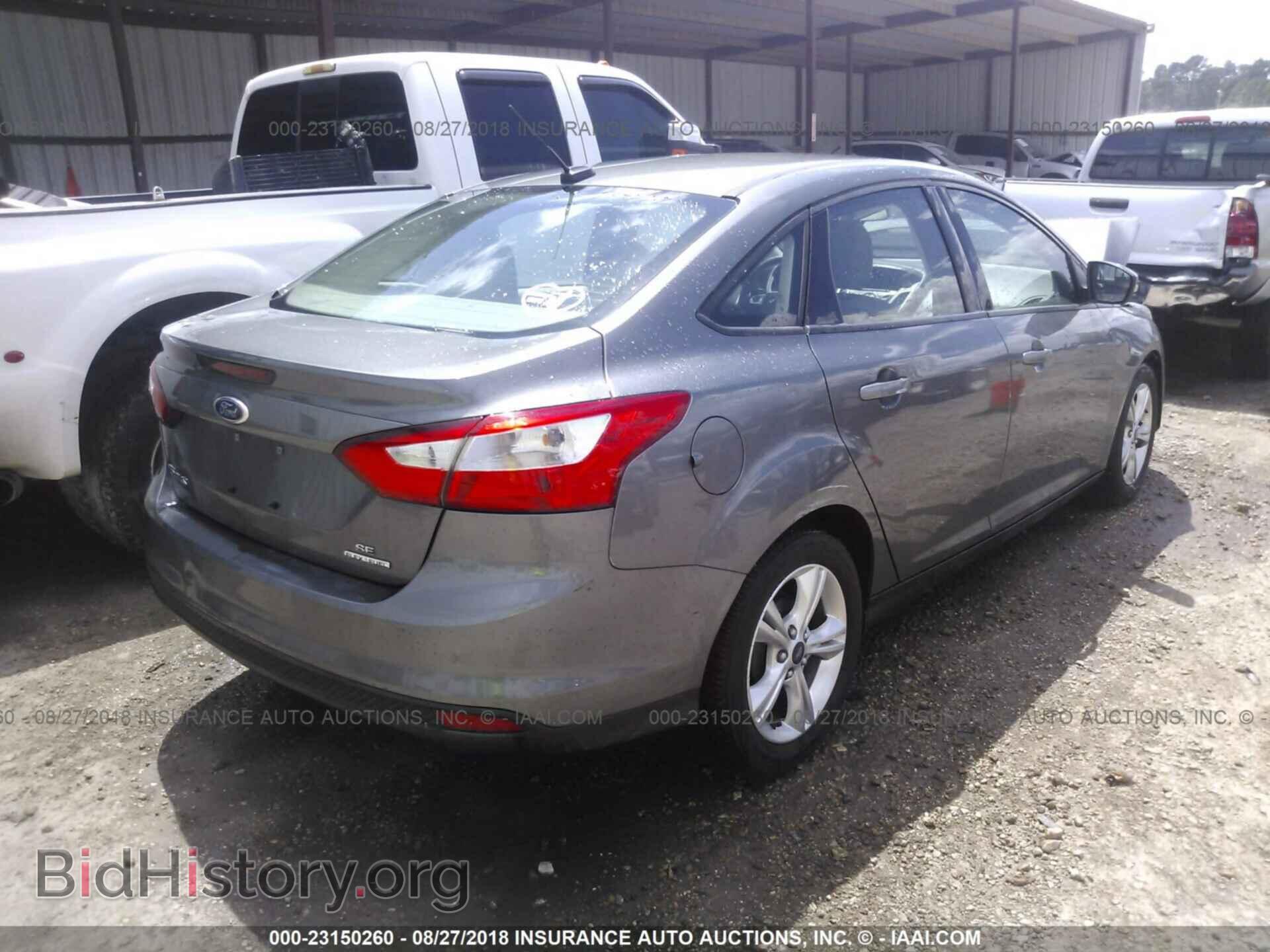 2013 Ford Focus - VIN: 1FADP3F22DL311852 - Photo 4