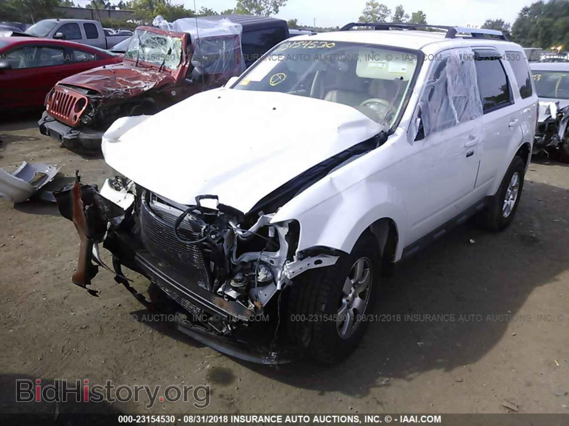 2011 Ford Escape - VIN: 1FMCU0EG3BKC69443 - Photo 2