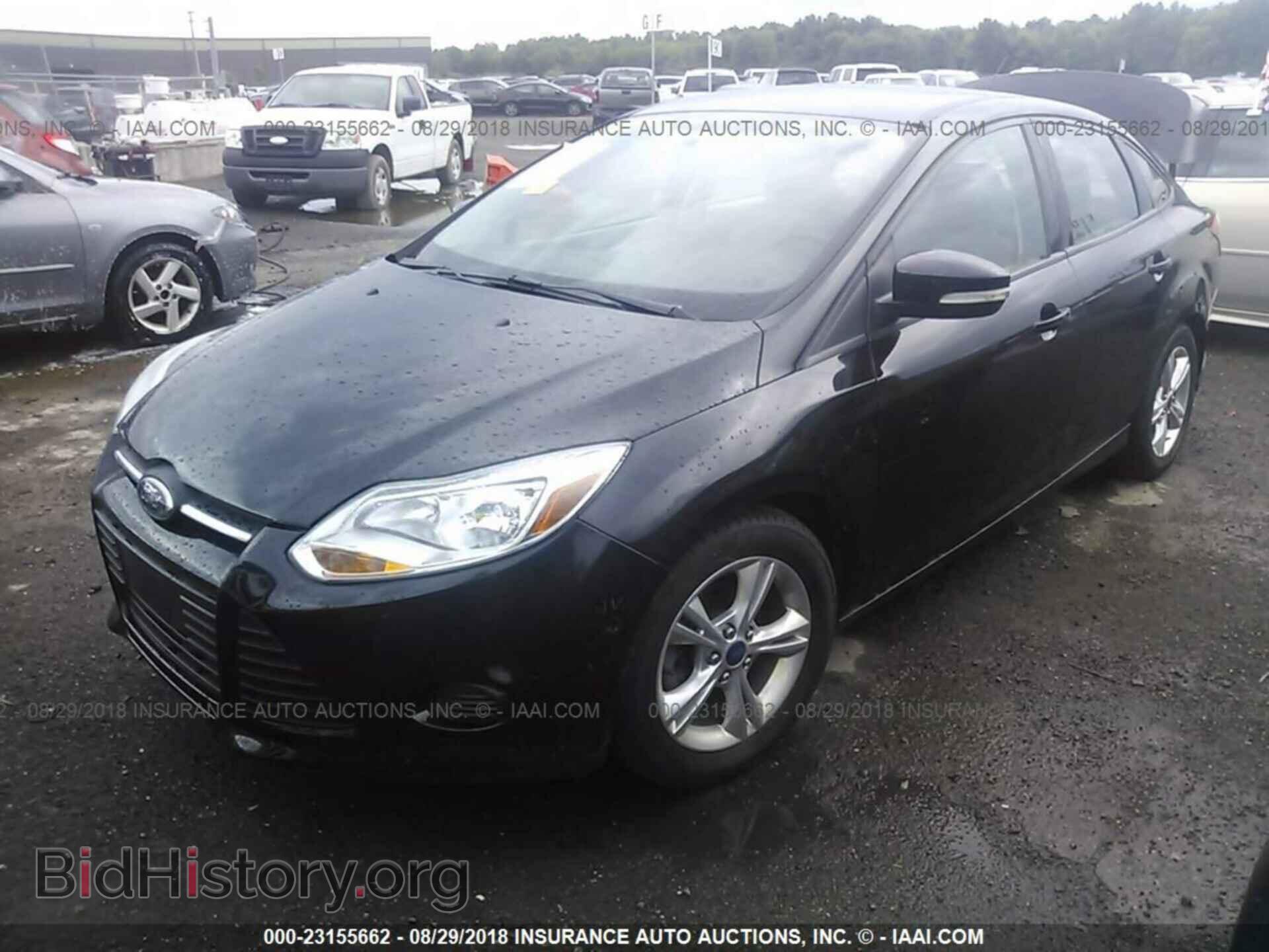 2014 Ford Focus - VIN: 1FADP3F20EL154386 - Фото 2