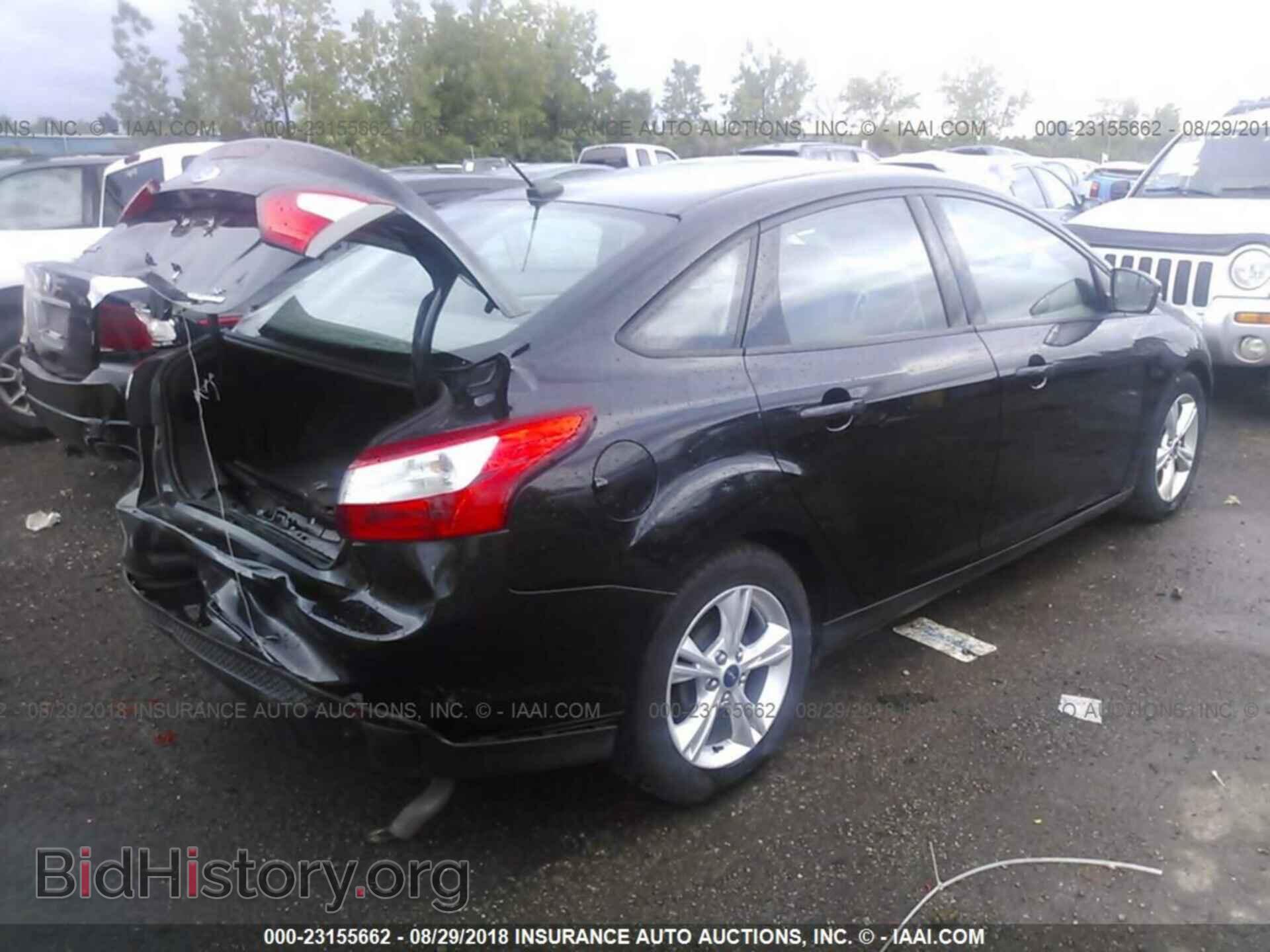 2014 Ford Focus - VIN: 1FADP3F20EL154386 - Фото 4