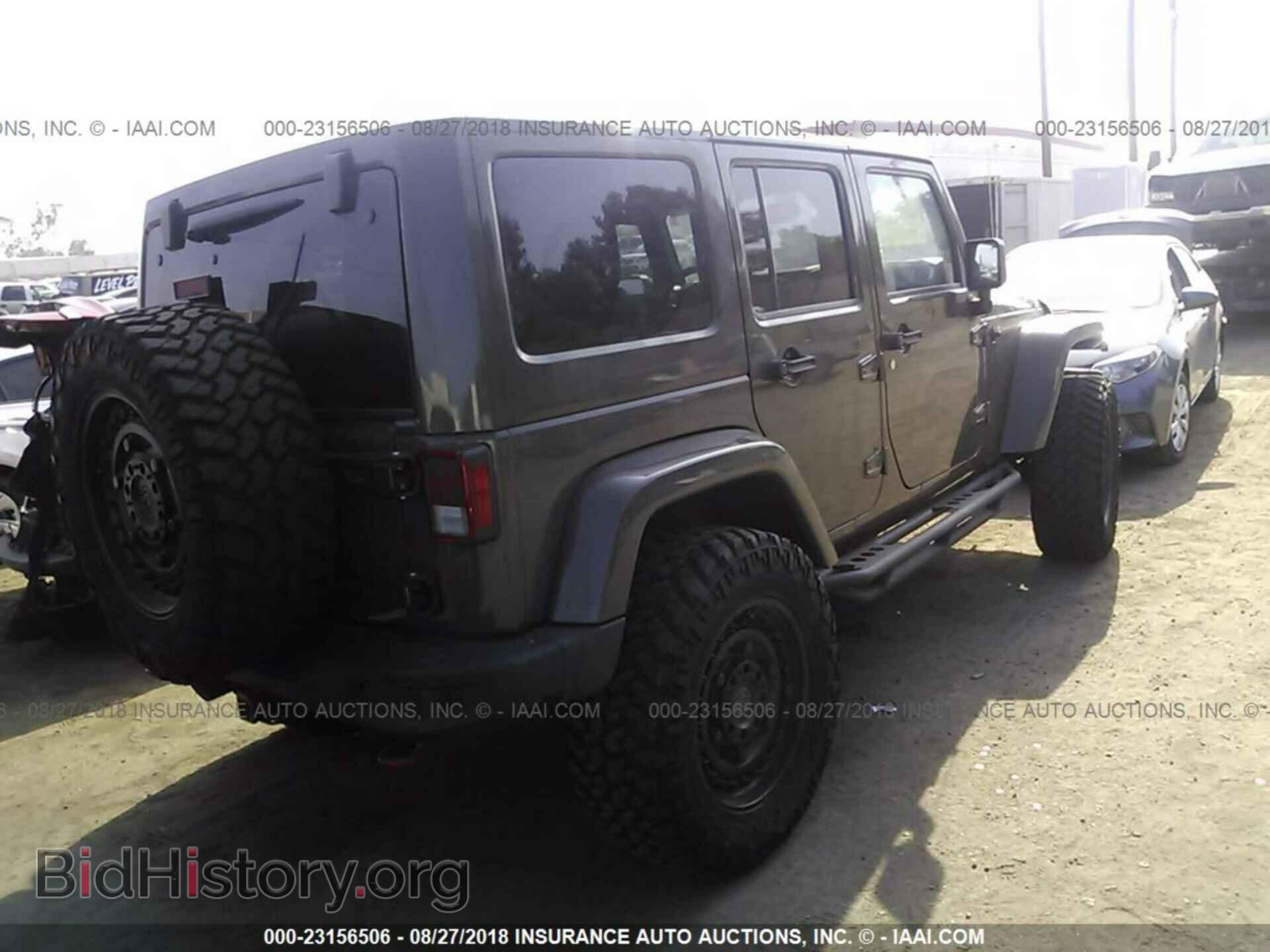 2015 Jeep Wrangler - VIN: 1C4HJWFG8FL607357 - Фото 4
