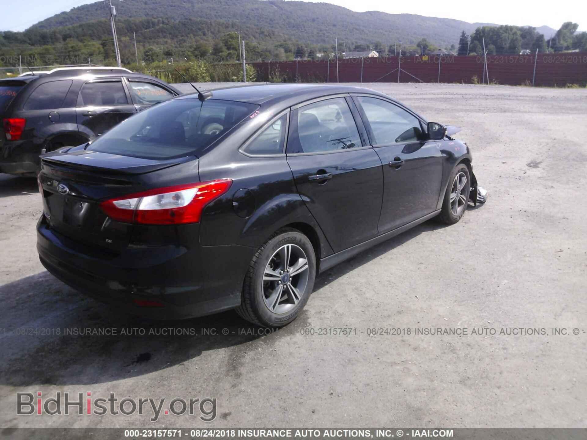 2014 Ford Focus - VIN: 1FADP3F28EL425193 - Фото 4