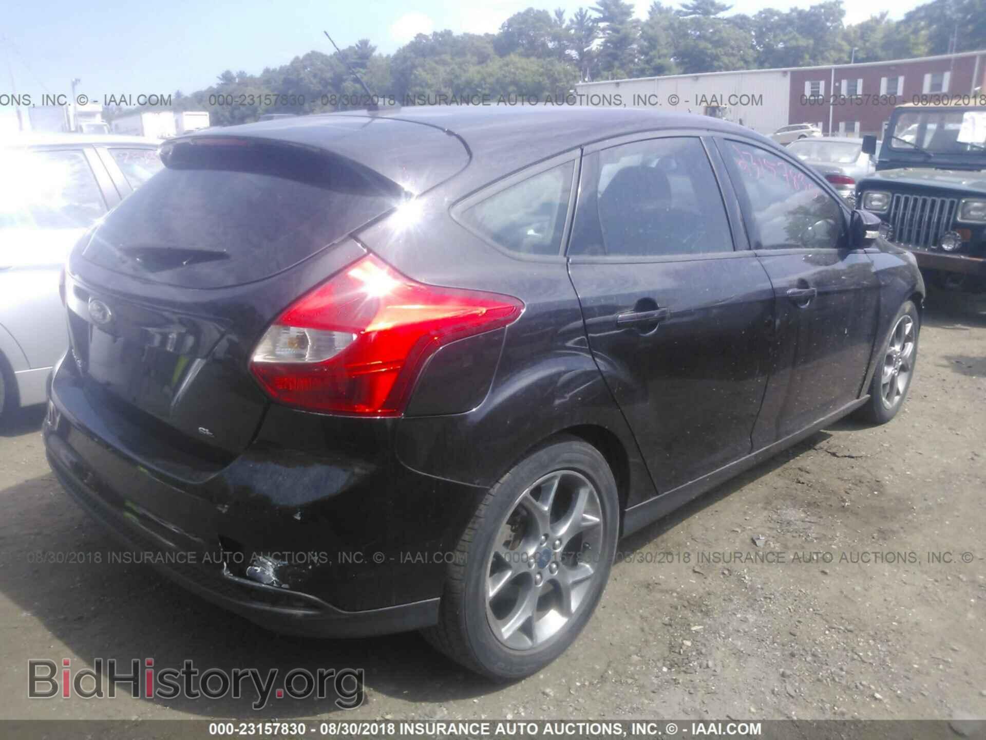 2014 Ford Focus - VIN: 1FADP3K2XEL337865 - Photo 4
