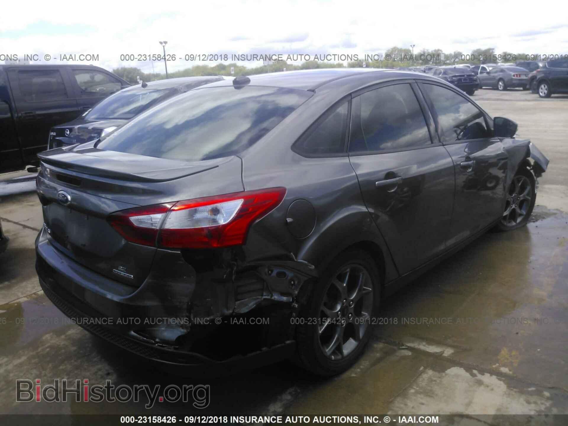 2013 Ford Focus - VIN: 1FADP3F28DL337016 - Photo 4