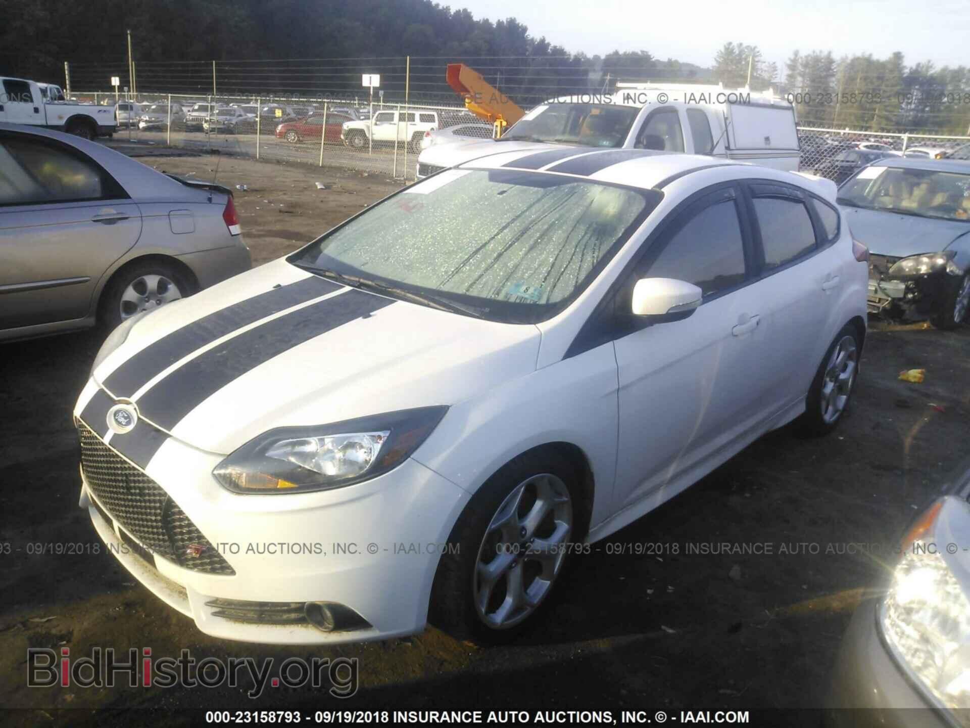 2014 Ford Focus - VIN: 1FADP3L98EL104806 - Фото 2