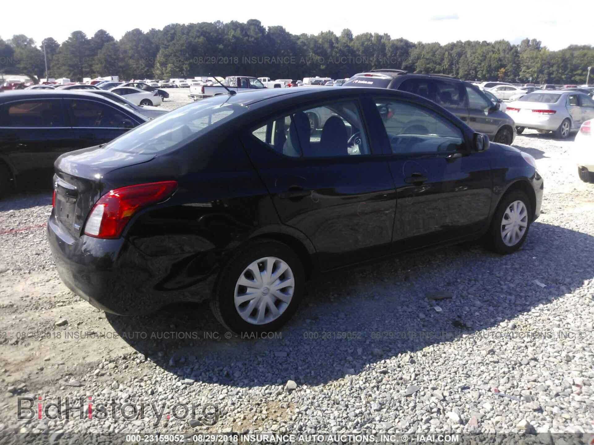 2014 Nissan Versa - VIN: 3N1CN7AP1EL831264 - Фото 4