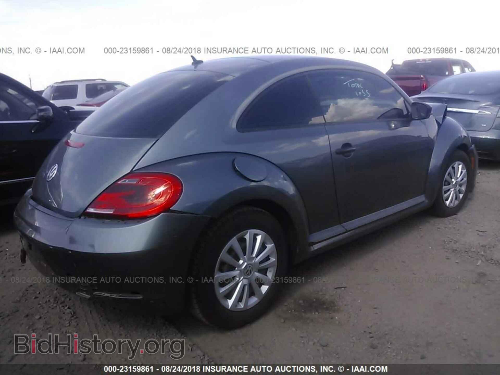 2012 Volkswagen Beetle - VIN: 3VWFP7AT7CM616607 - Фото 4
