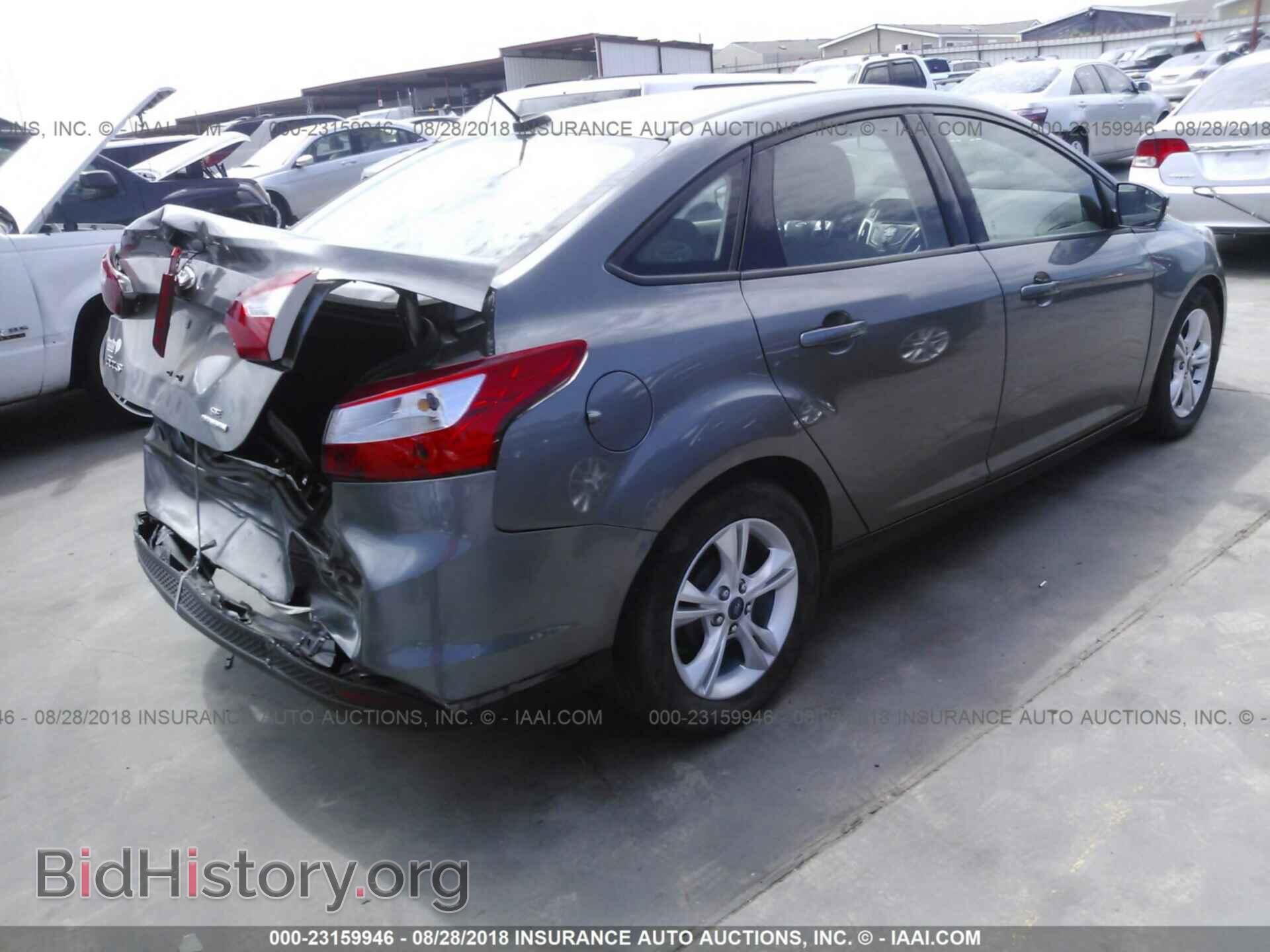 2014 Ford Focus - VIN: 1FADP3F23EL451863 - Photo 4