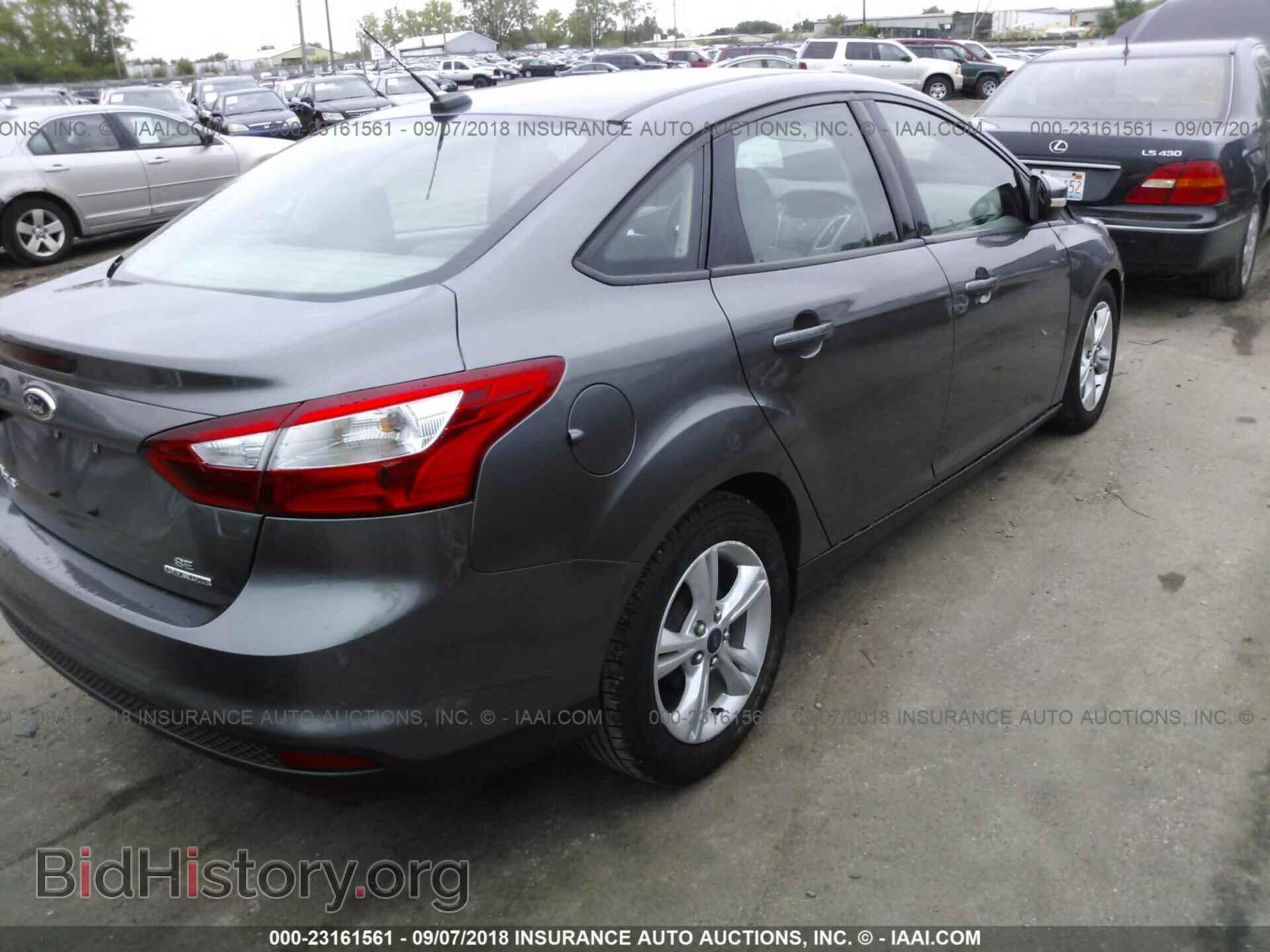 2014 Ford Focus - VIN: 1FADP3F23EL265840 - Photo 4