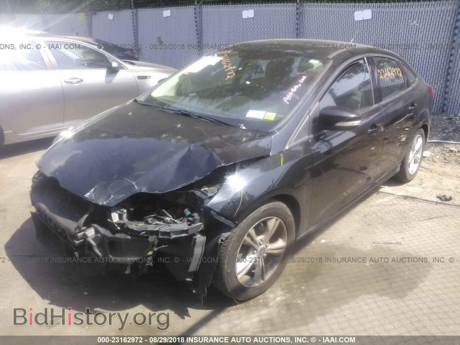 2014 Ford Focus - VIN: 1FADP3F29EL164639 - Фото 2