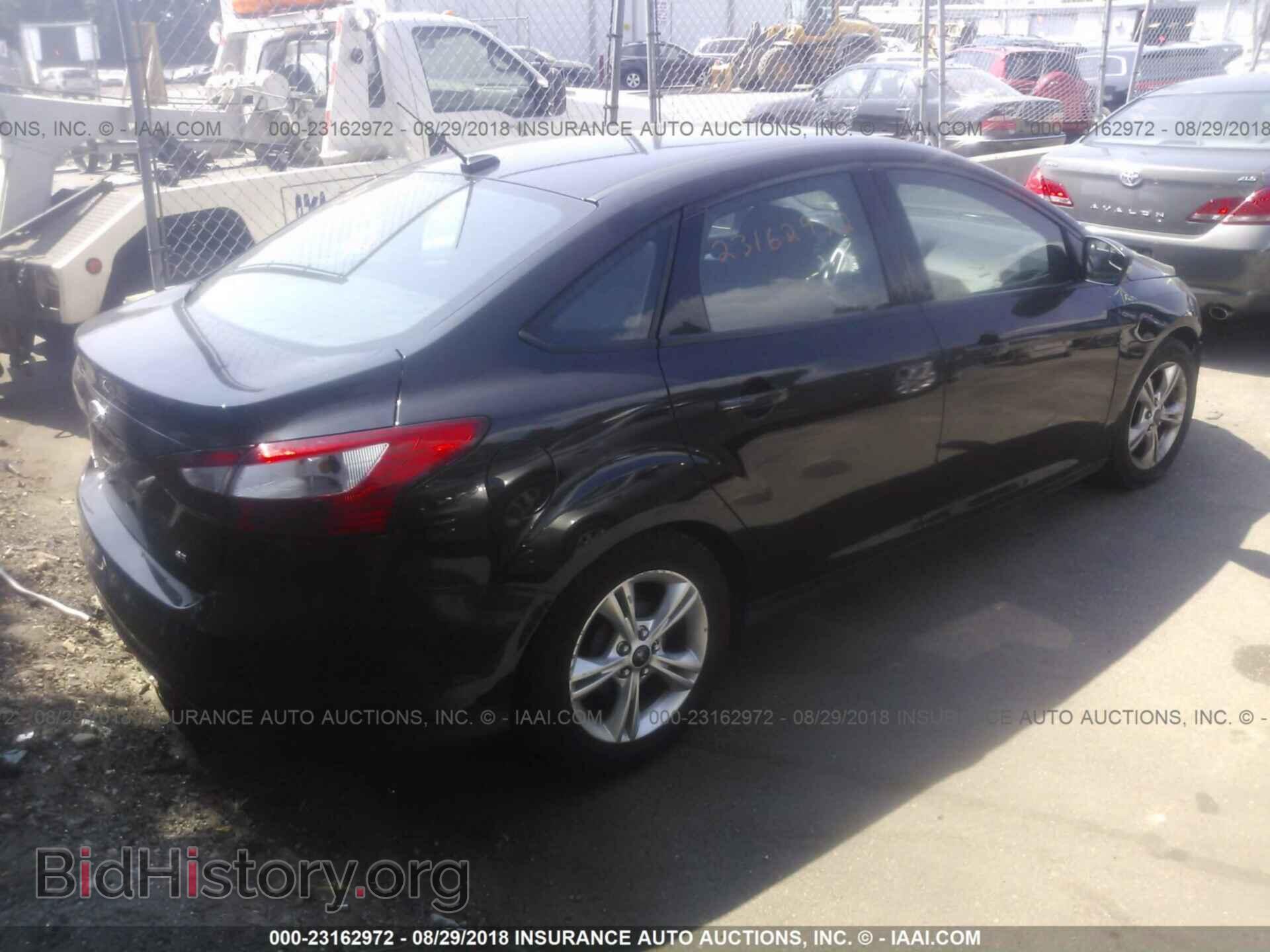 2014 Ford Focus - VIN: 1FADP3F29EL164639 - Фото 4