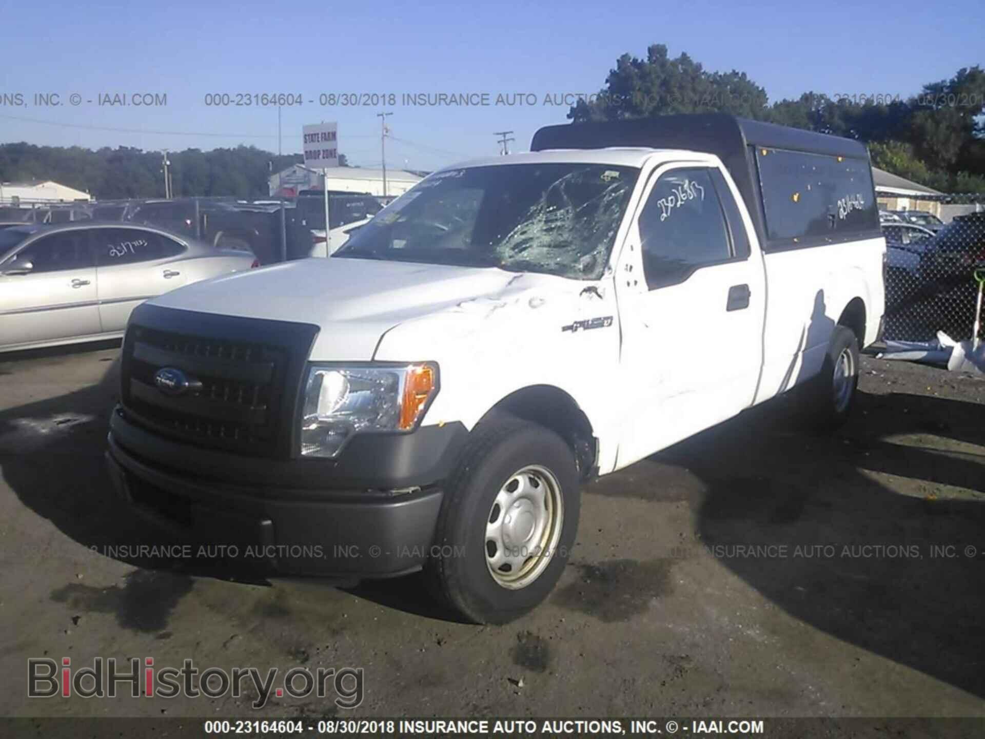 2014 Ford F150 - VIN: 1FTMF1CM4EKE62383 - Photo 2