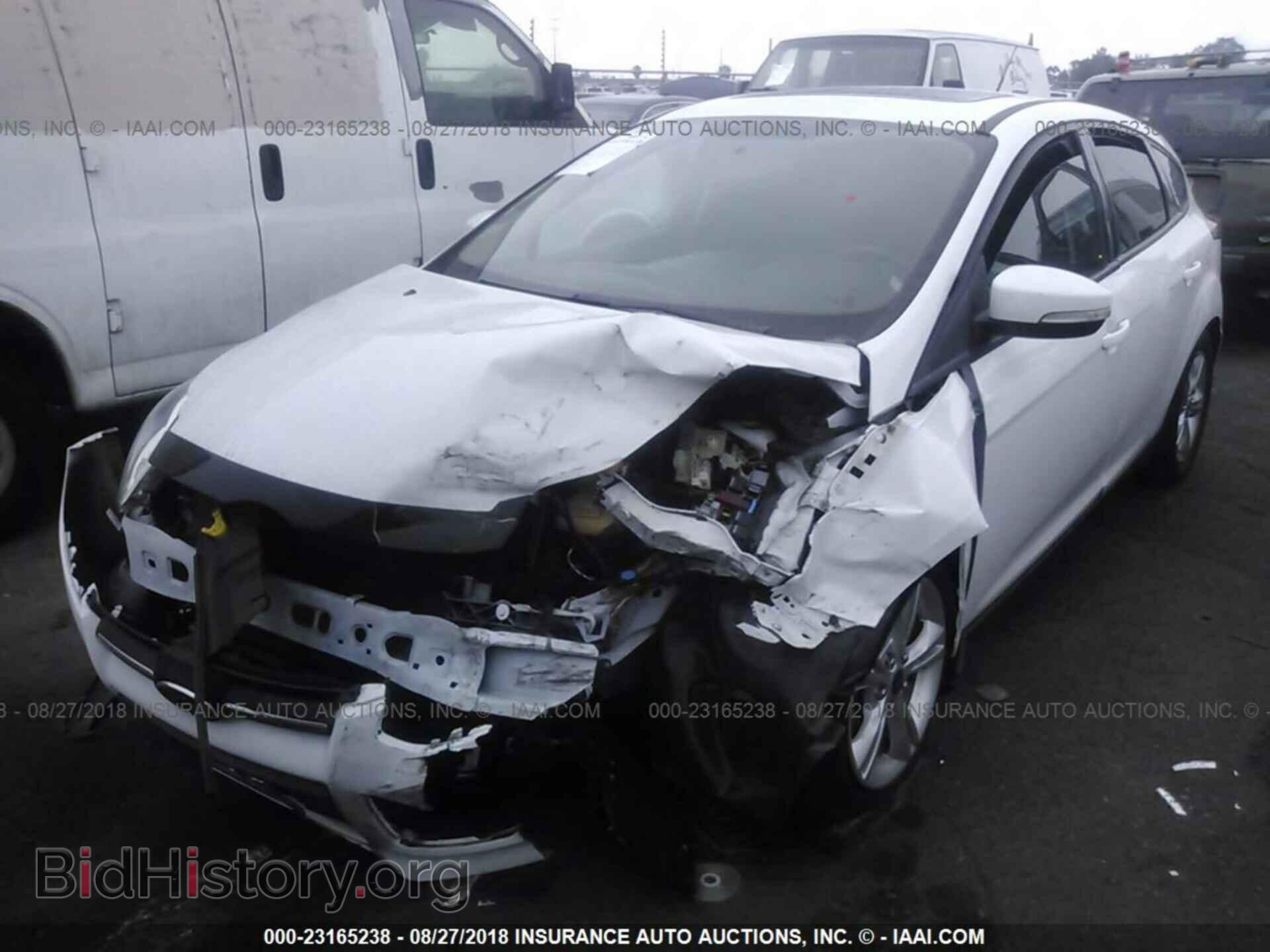 2014 Ford Focus - VIN: 1FADP3K21EL288040 - Фото 2