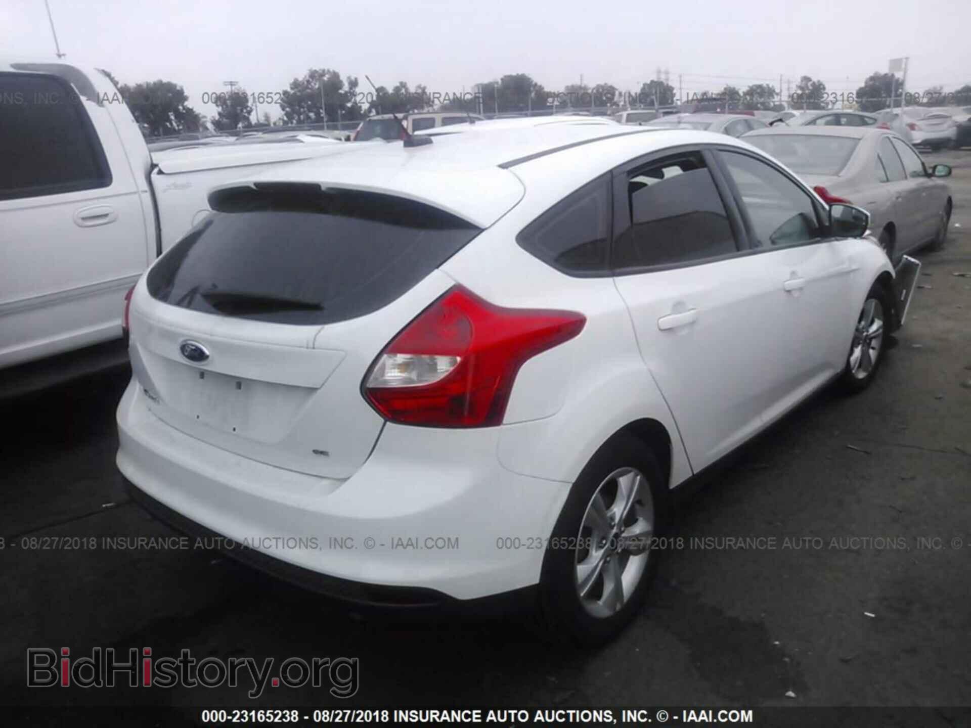 2014 Ford Focus - VIN: 1FADP3K21EL288040 - Фото 4