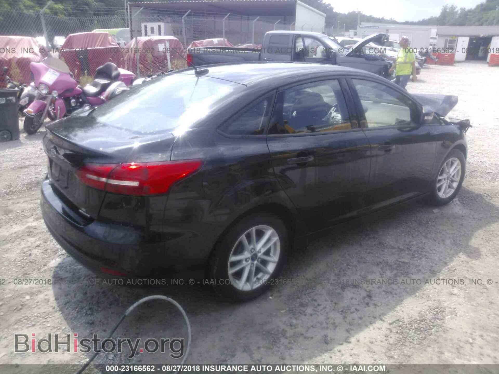 2015 FORD FOCUS - VIN: 1FADP3F29FL218166 - Photo 4