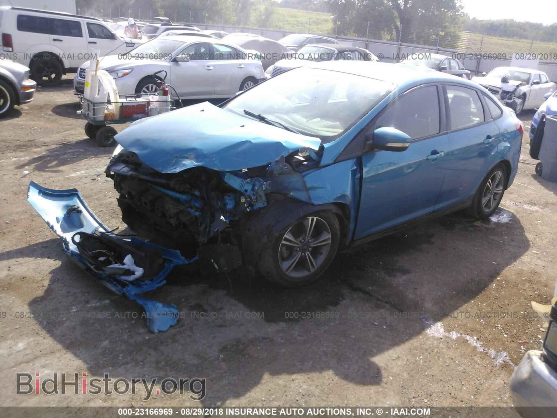 2014 Ford Focus - VIN: 1FADP3F21EL281275 - Photo 2