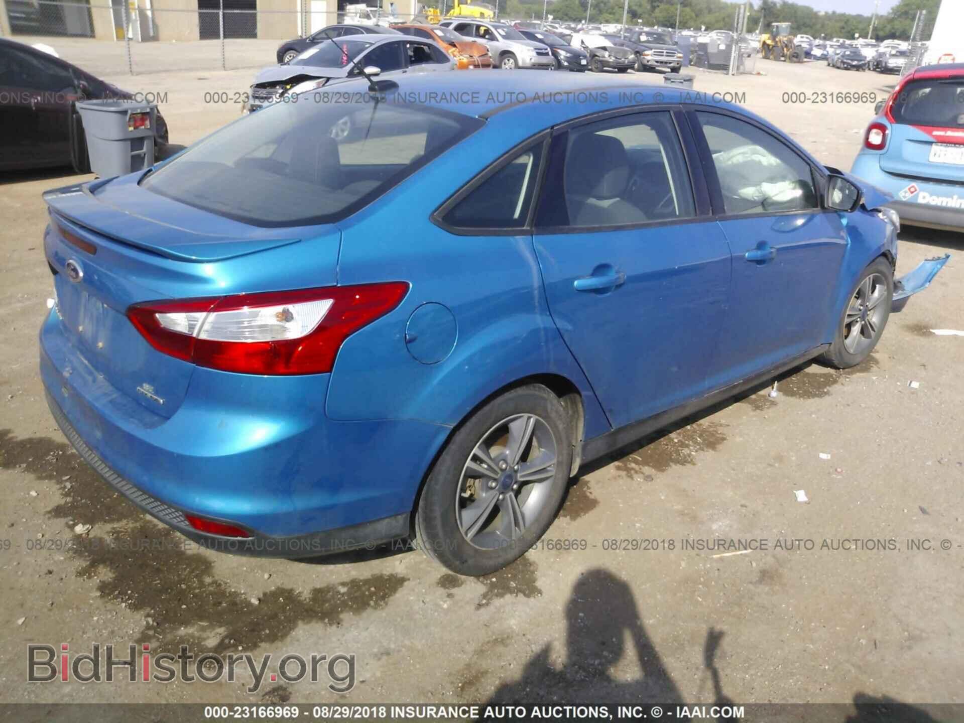 2014 Ford Focus - VIN: 1FADP3F21EL281275 - Photo 4
