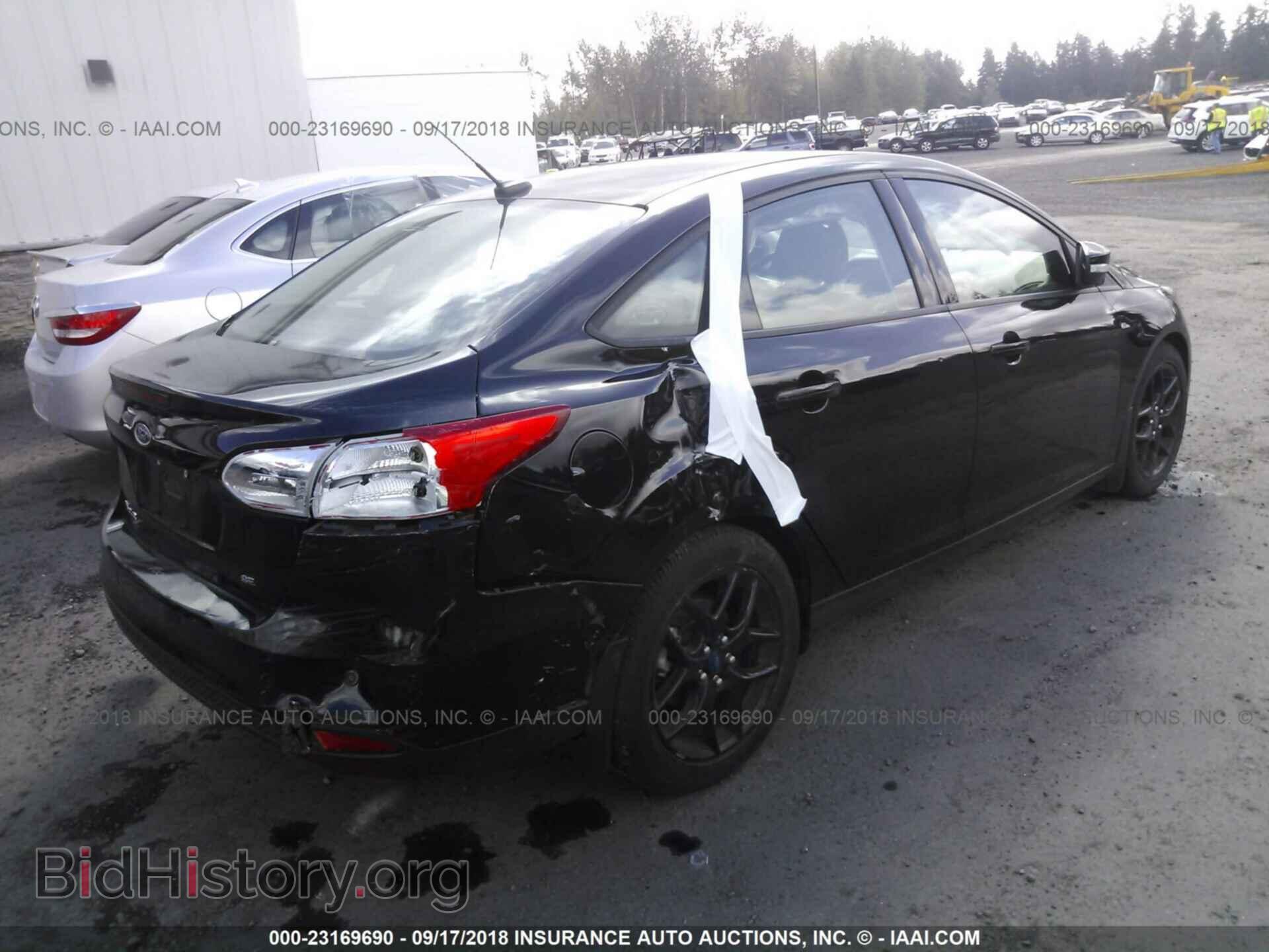2016 Ford Focus - VIN: 1FADP3F26GL209555 - Фото 4