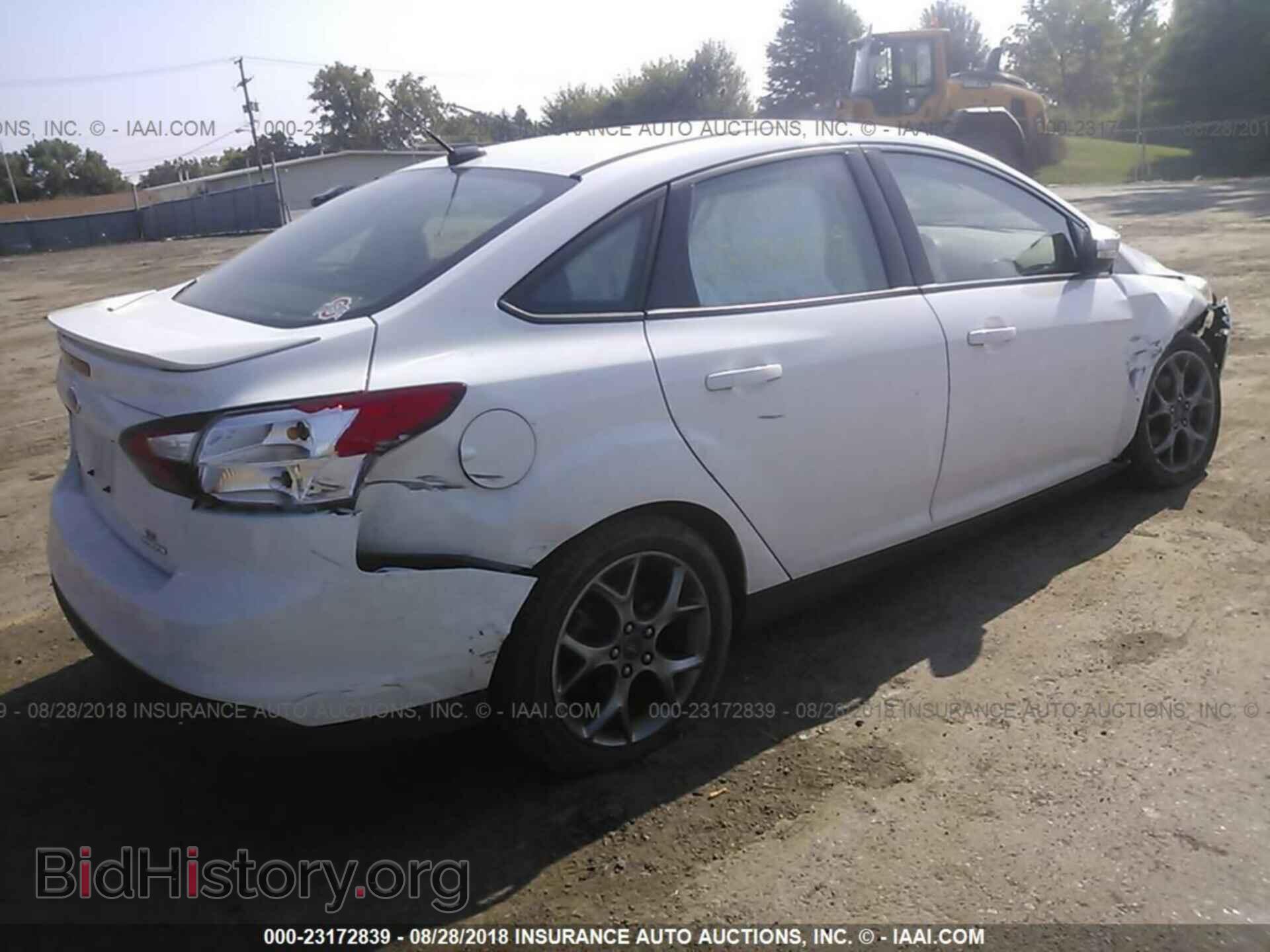 2014 Ford Focus - VIN: 1FADP3F27EL174280 - Photo 4