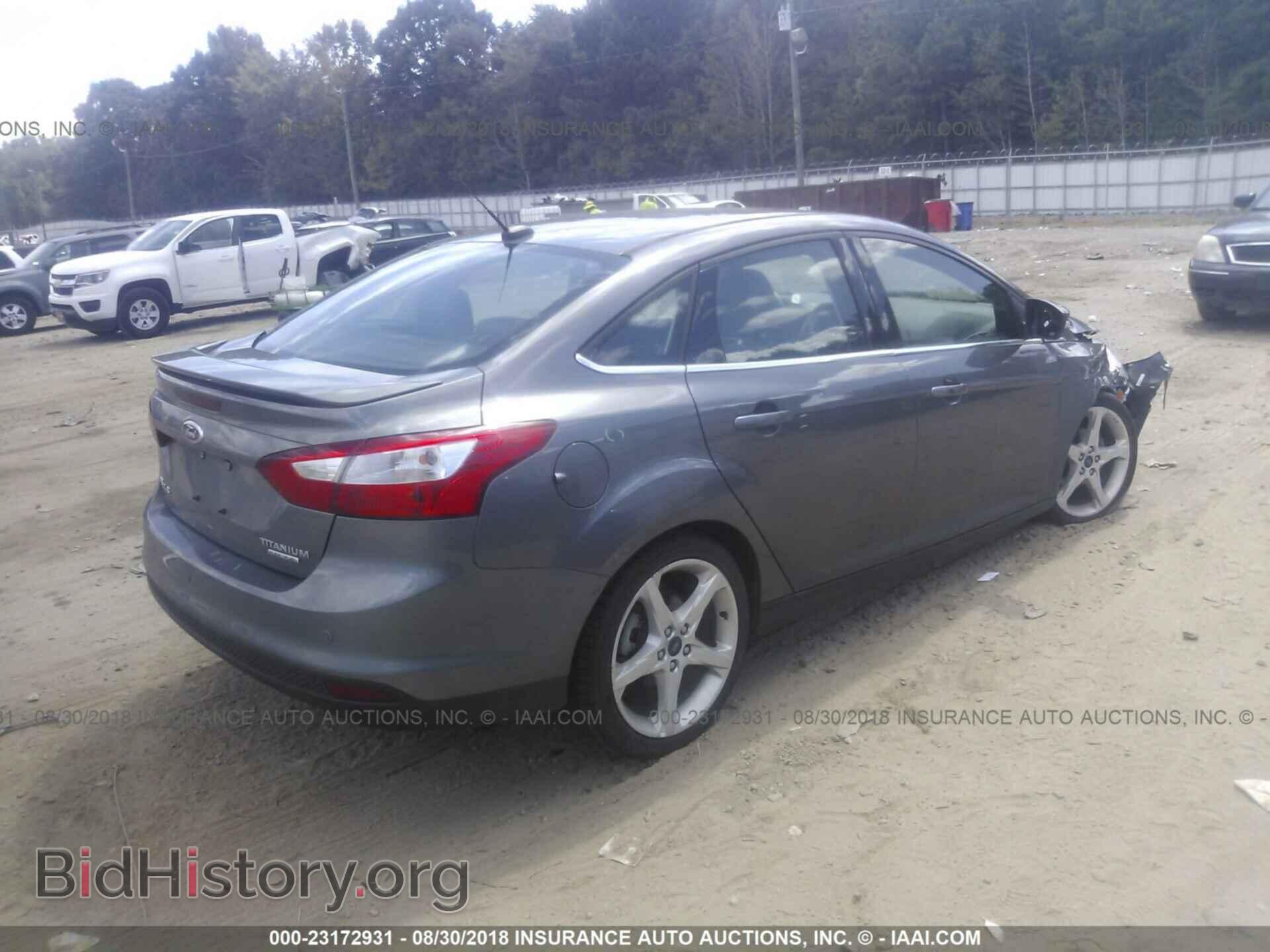 2014 Ford Focus - VIN: 1FADP3J27EL309264 - Photo 4