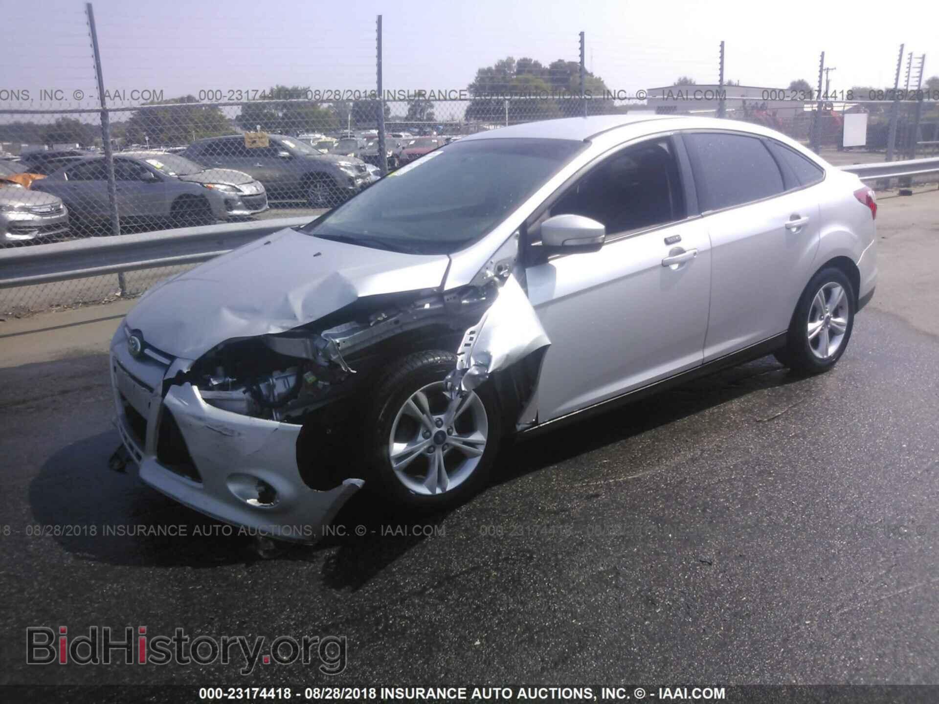 2014 Ford Focus - VIN: 1FADP3F24EL125389 - Фото 2