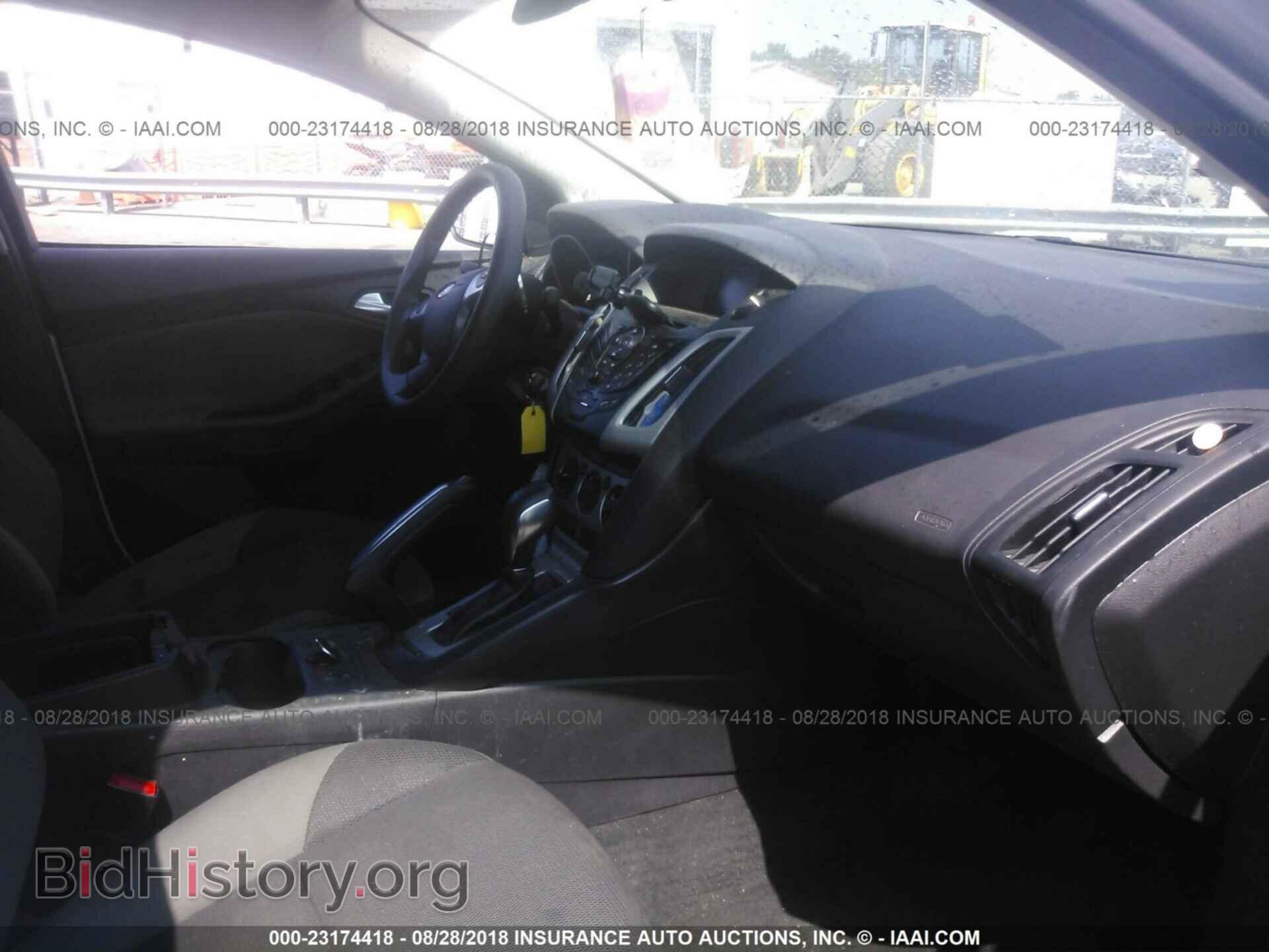 2014 Ford Focus - VIN: 1FADP3F24EL125389 - Фото 5