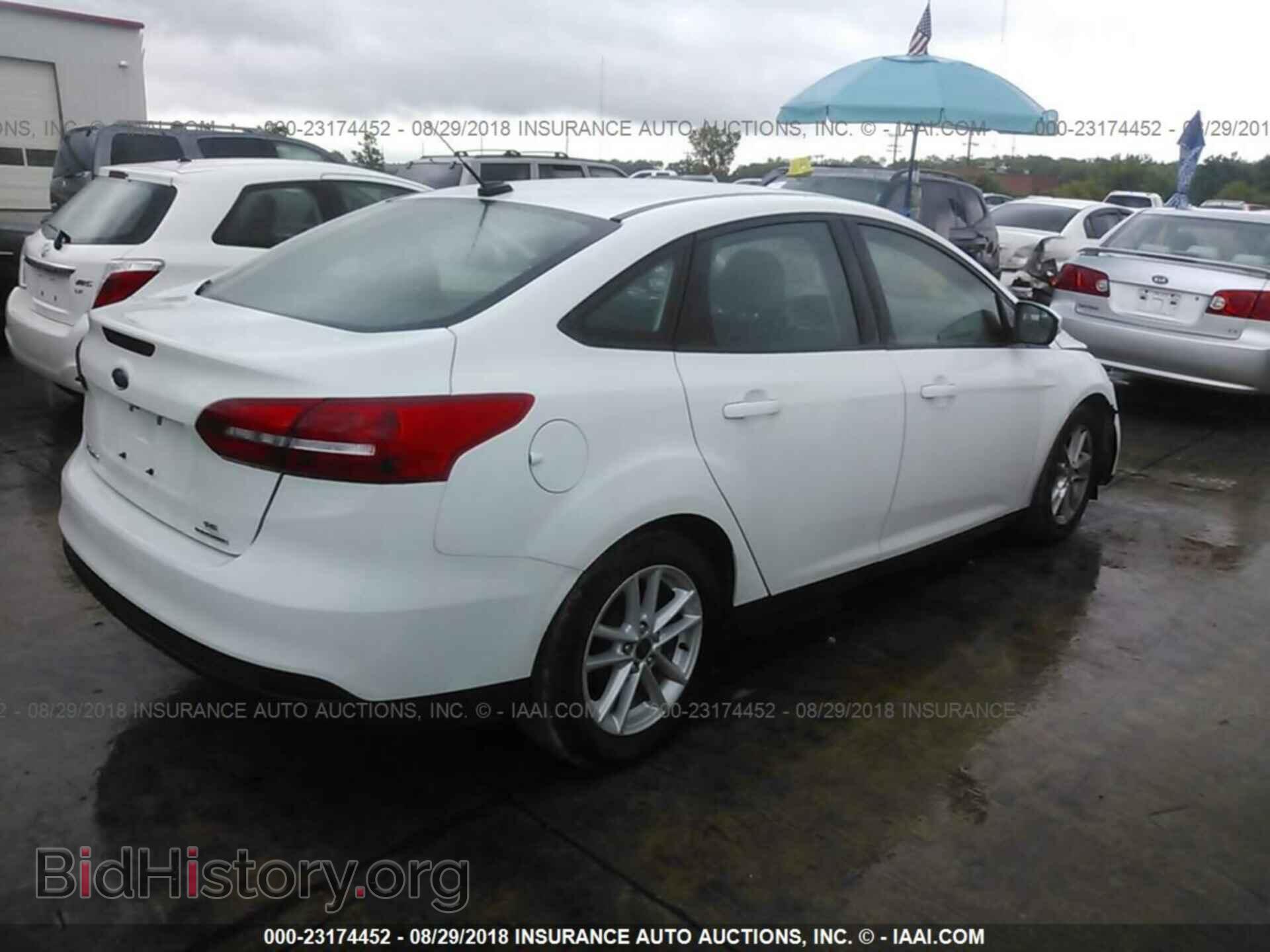 2016 Ford Focus - VIN: 1FADP3F22GL283104 - Фото 4