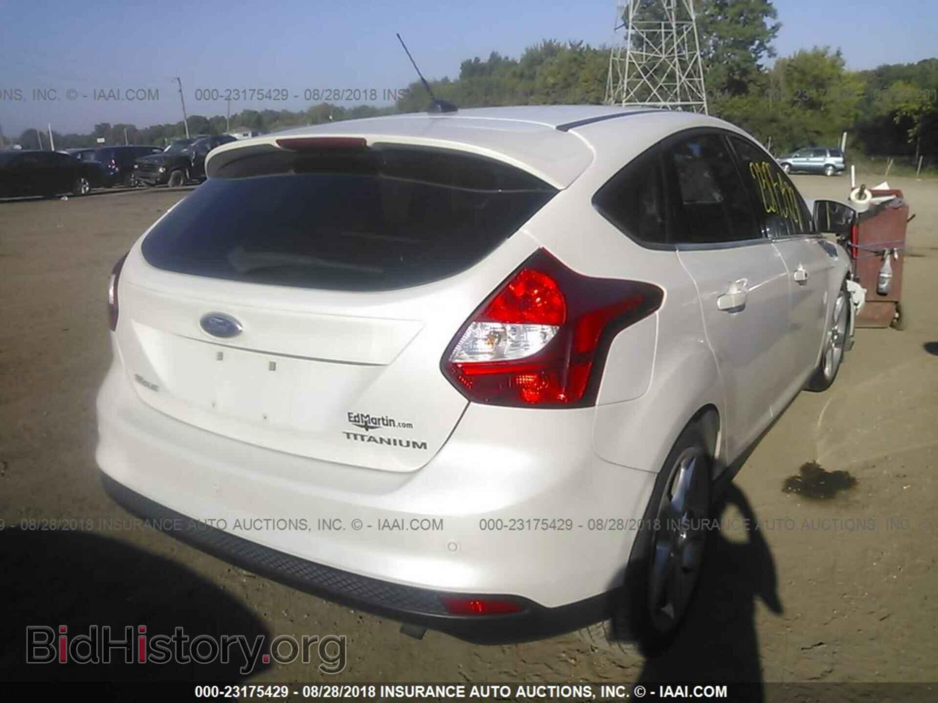 2012 Ford Focus - VIN: 1FAHP3N24CL342604 - Photo 4