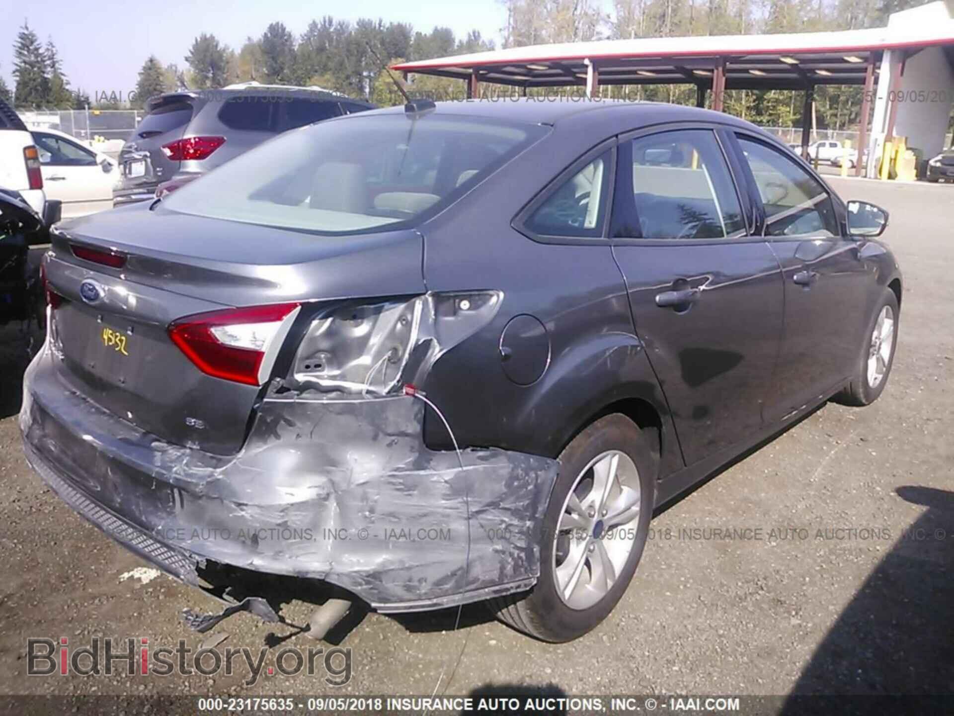 2014 Ford Focus - VIN: 1FADP3F28EL459103 - Photo 4