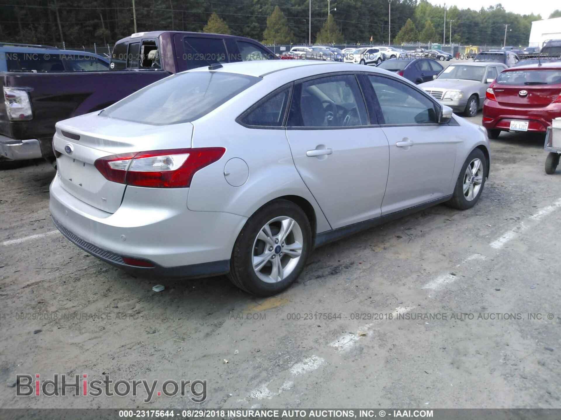 2014 Ford Focus - VIN: 1FADP3F29EL158940 - Фото 4
