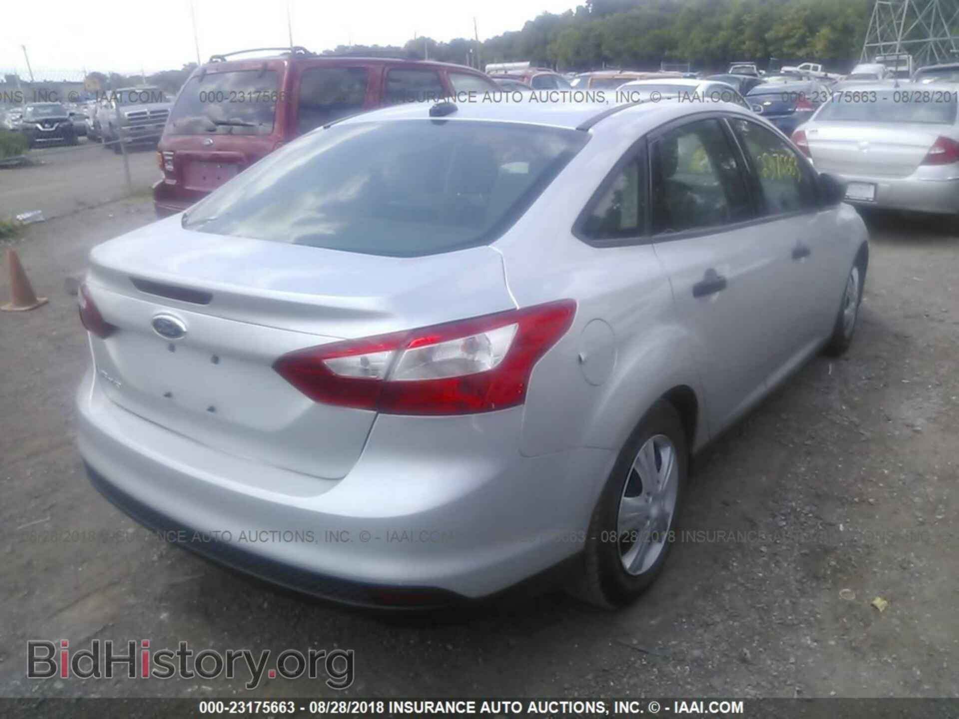 2014 Ford Focus - VIN: 1FADP3E23EL282588 - Фото 4