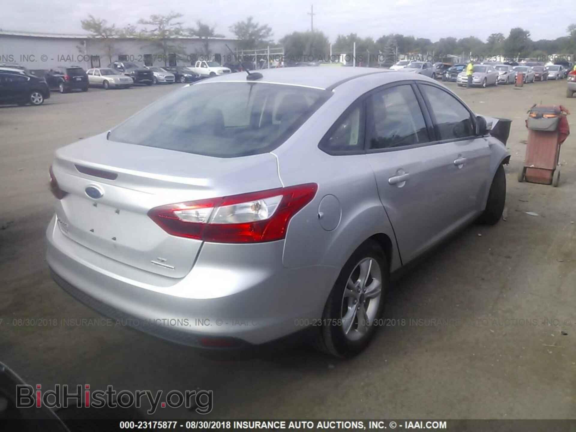 2014 Ford Focus - VIN: 1FADP3F27EL218021 - Фото 4