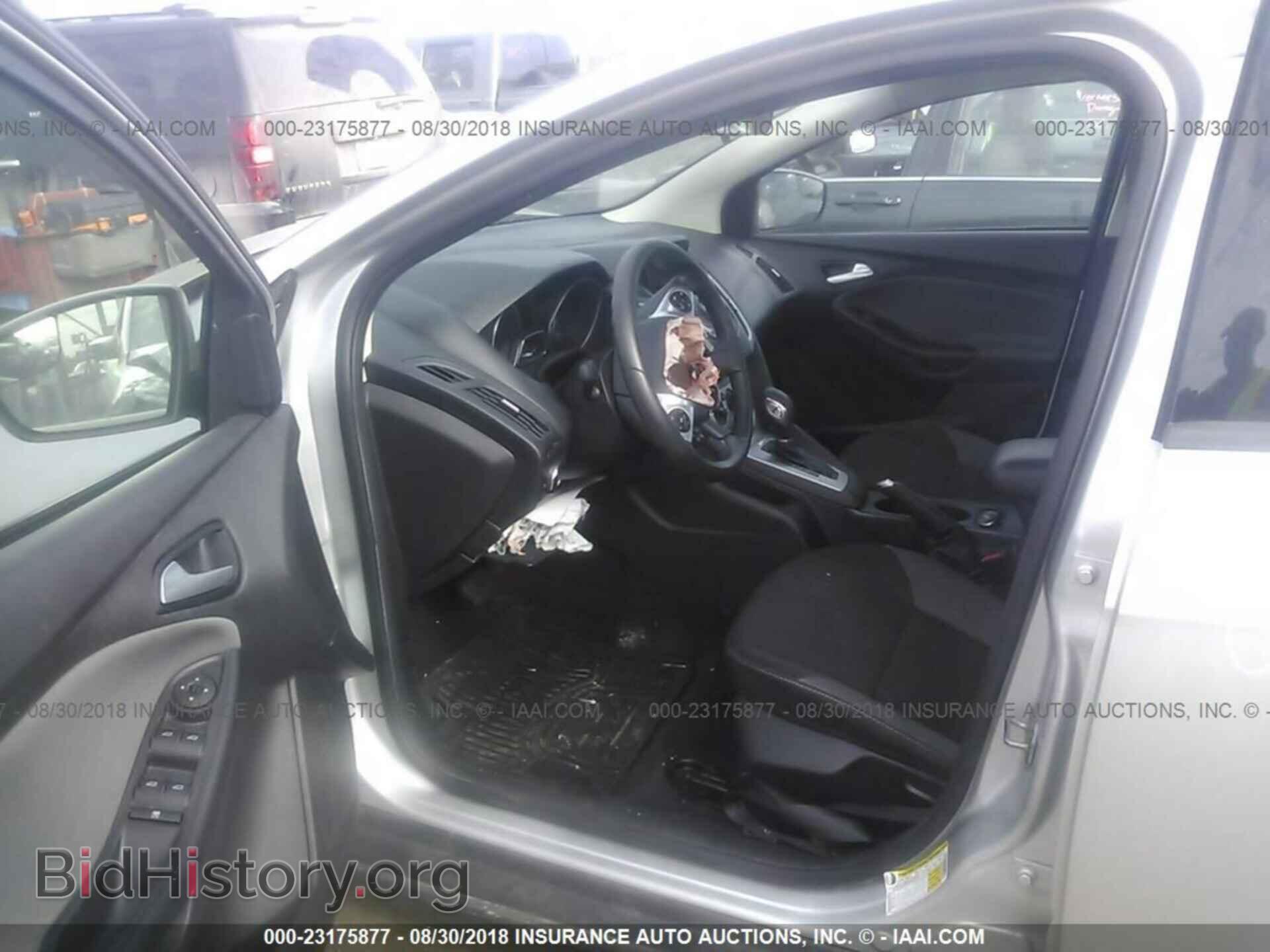 2014 Ford Focus - VIN: 1FADP3F27EL218021 - Фото 5