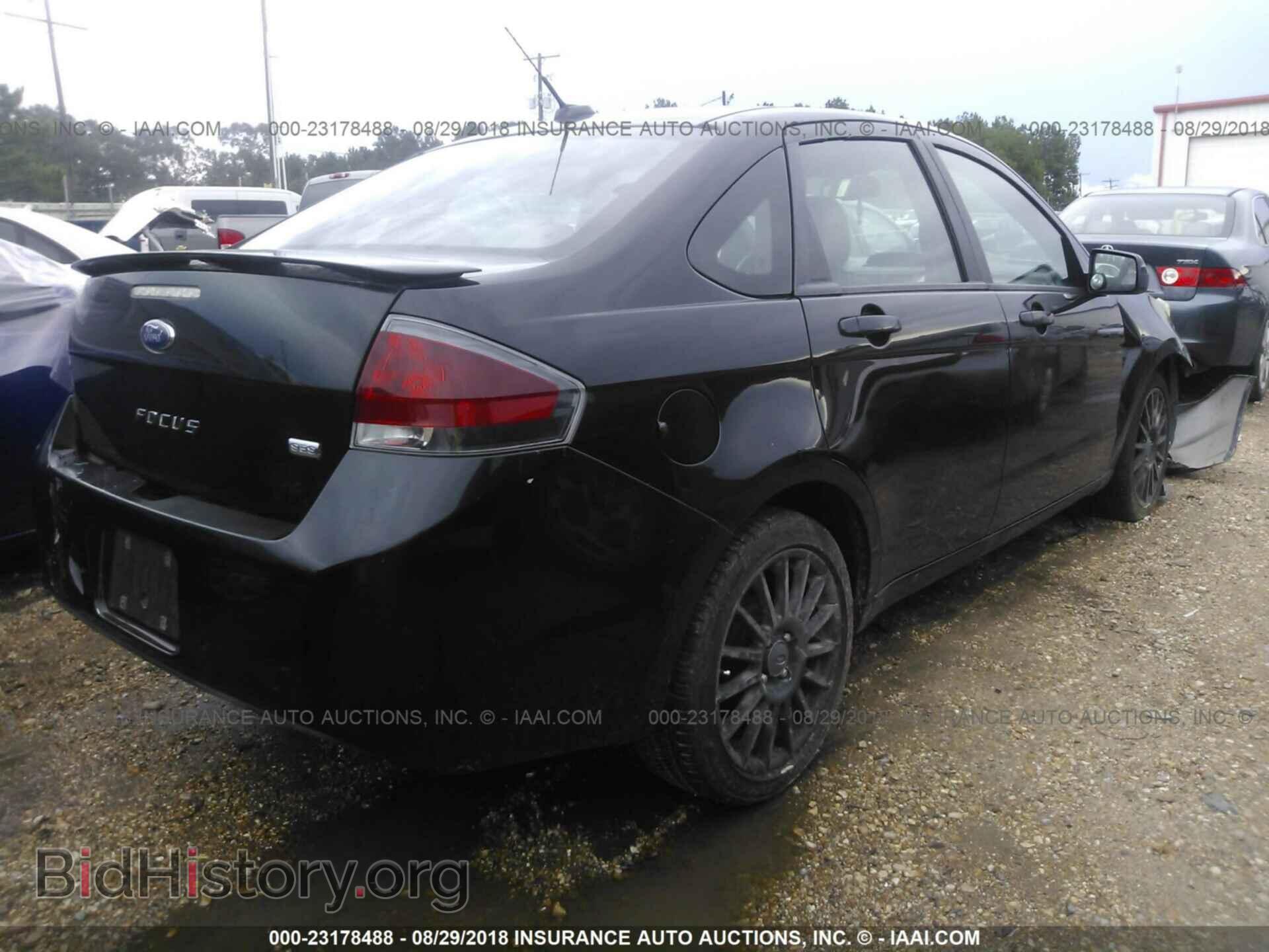 2011 Ford Focus - VIN: 1FAHP3GN1BW108537 - Photo 4