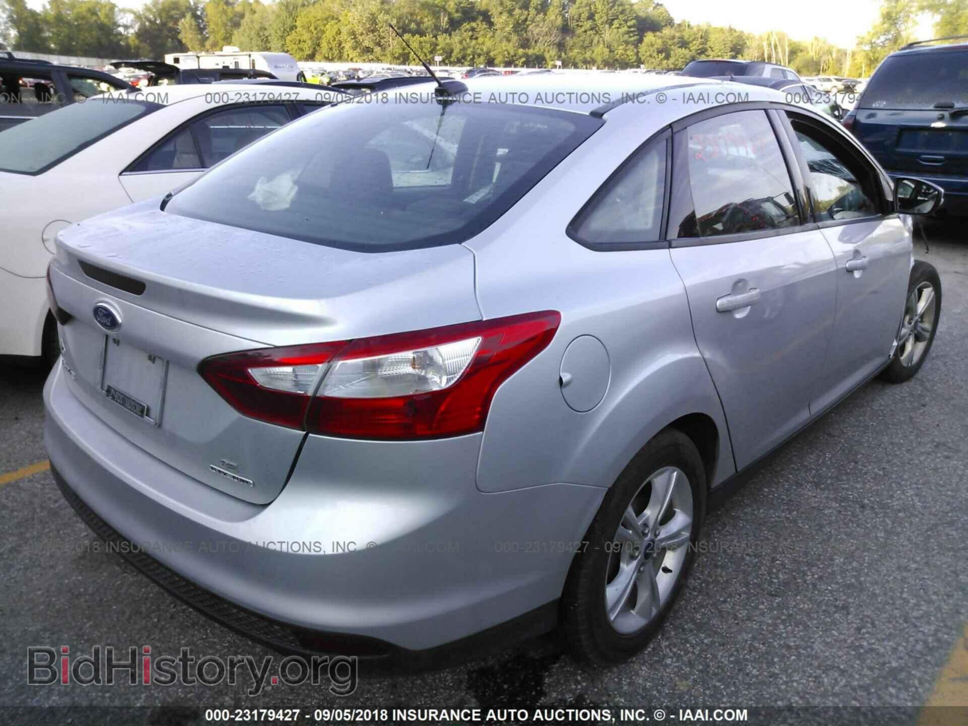 2013 Ford Focus - VIN: 1FADP3F29DL380697 - Photo 4