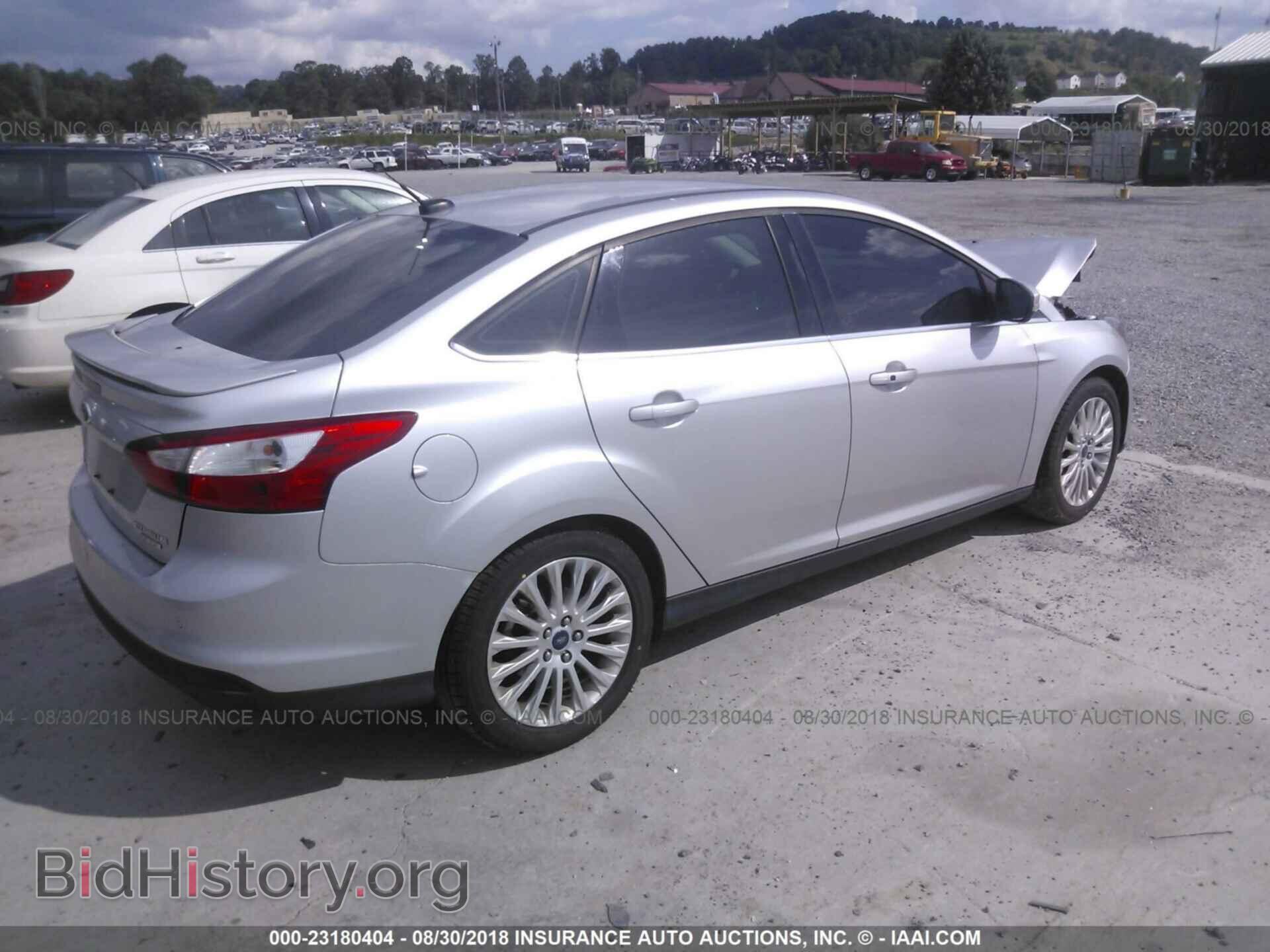 2012 Ford Focus - VIN: 1FAHP3J2XCL480198 - Photo 4