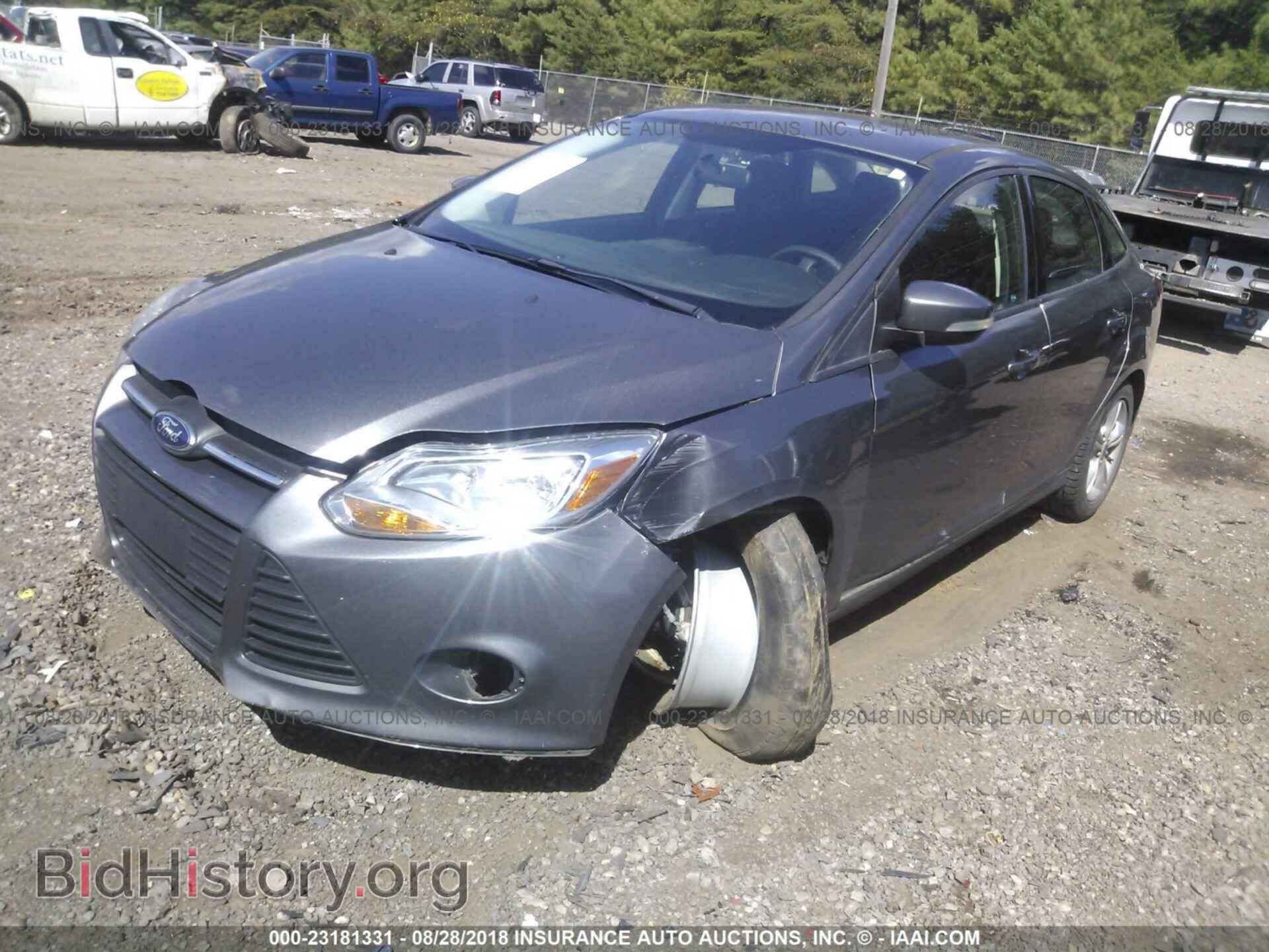 2014 Ford Focus - VIN: 1FADP3F21EL257641 - Фото 2