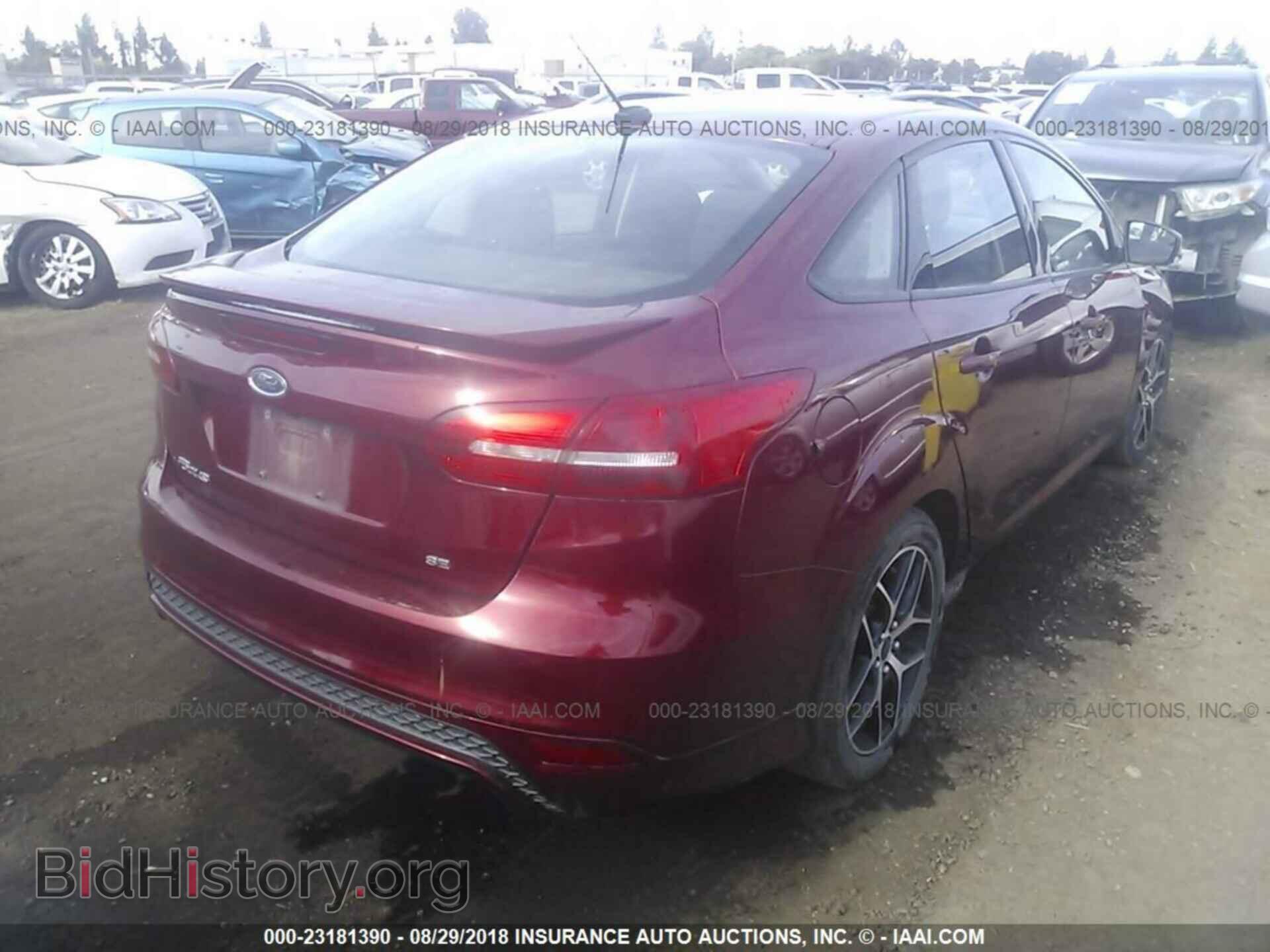 2016 Ford Focus - VIN: 1FADP3F21GL254919 - Photo 4