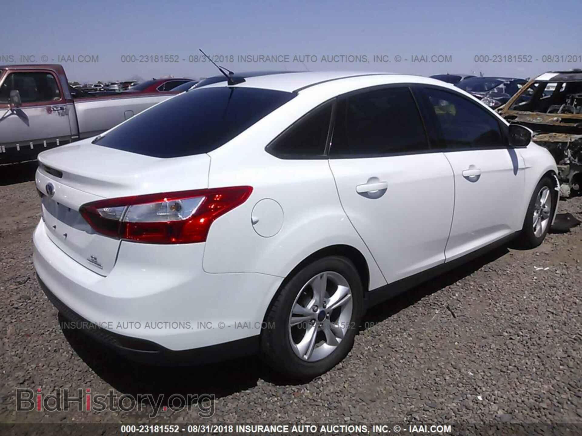 2014 Ford Focus - VIN: 1FADP3F22EL453751 - Фото 4