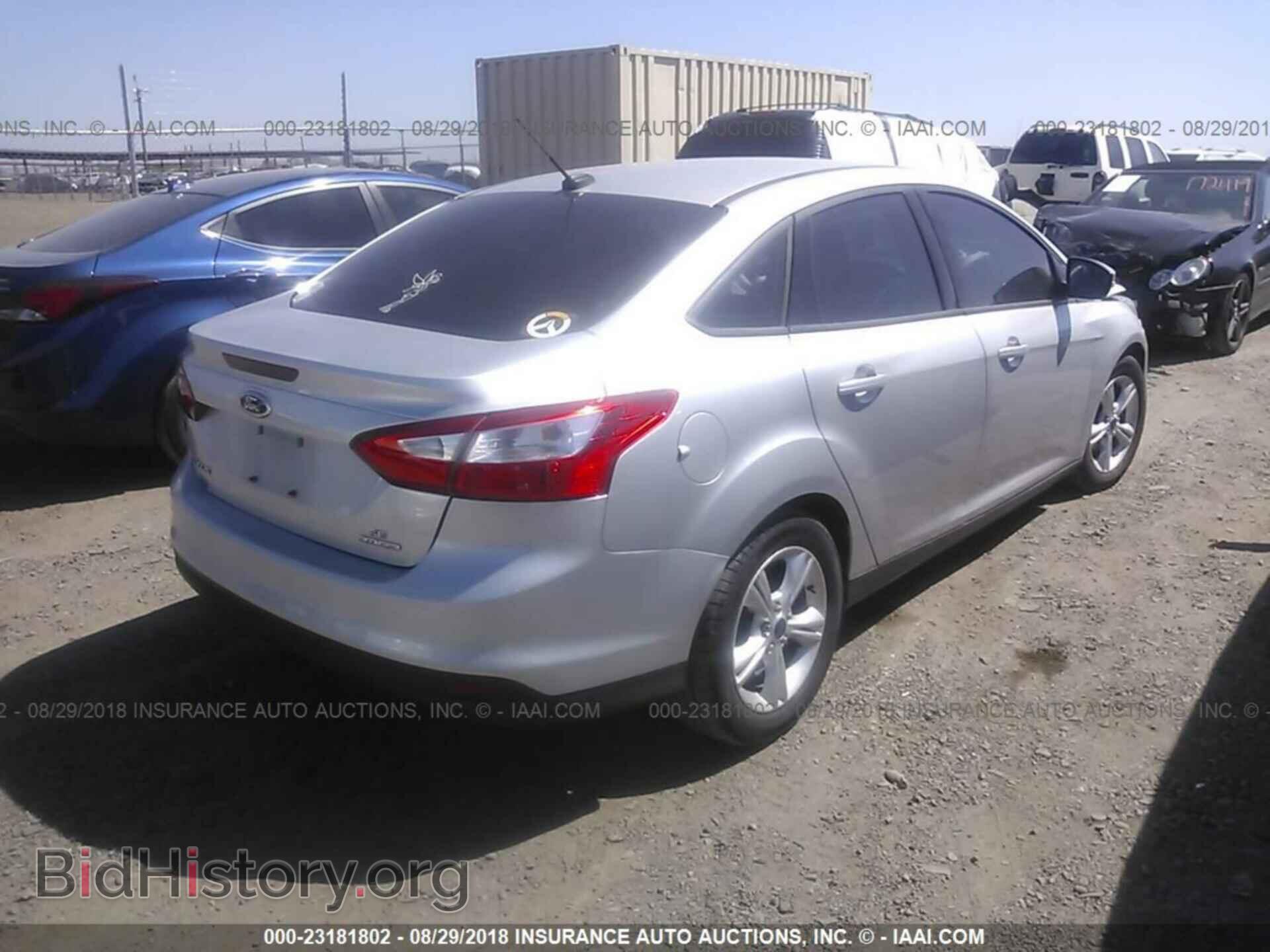 2014 Ford Focus - VIN: 1FADP3F23EL453824 - Фото 4