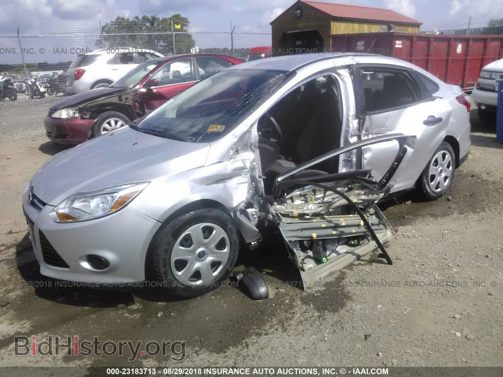 2014 Ford Focus - VIN: 1FADP3E23EL129211 - Фото 2