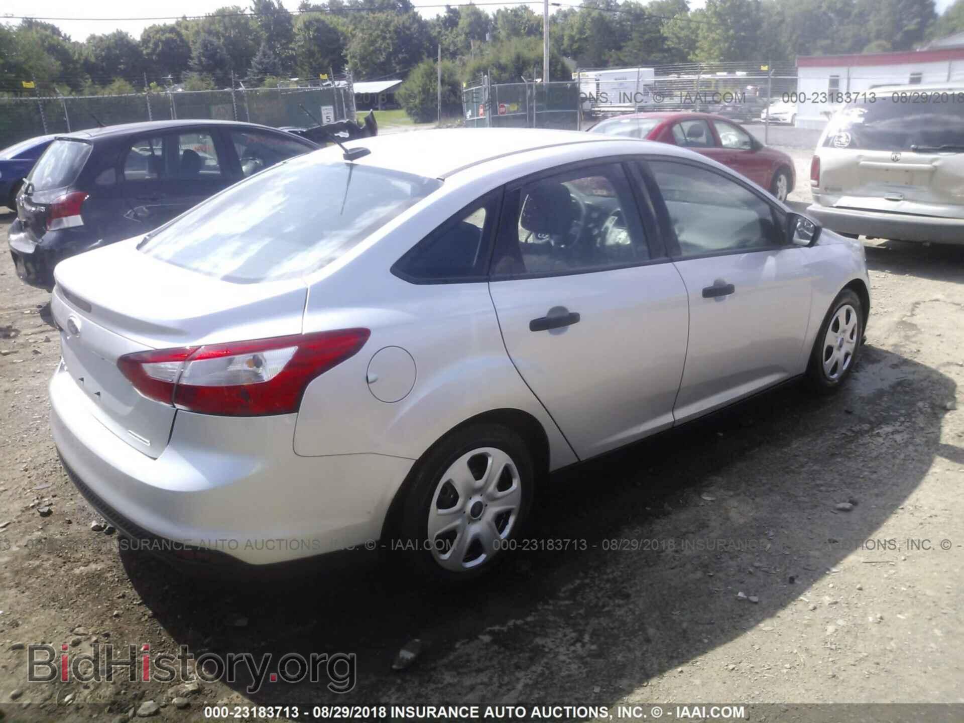 2014 Ford Focus - VIN: 1FADP3E23EL129211 - Фото 4