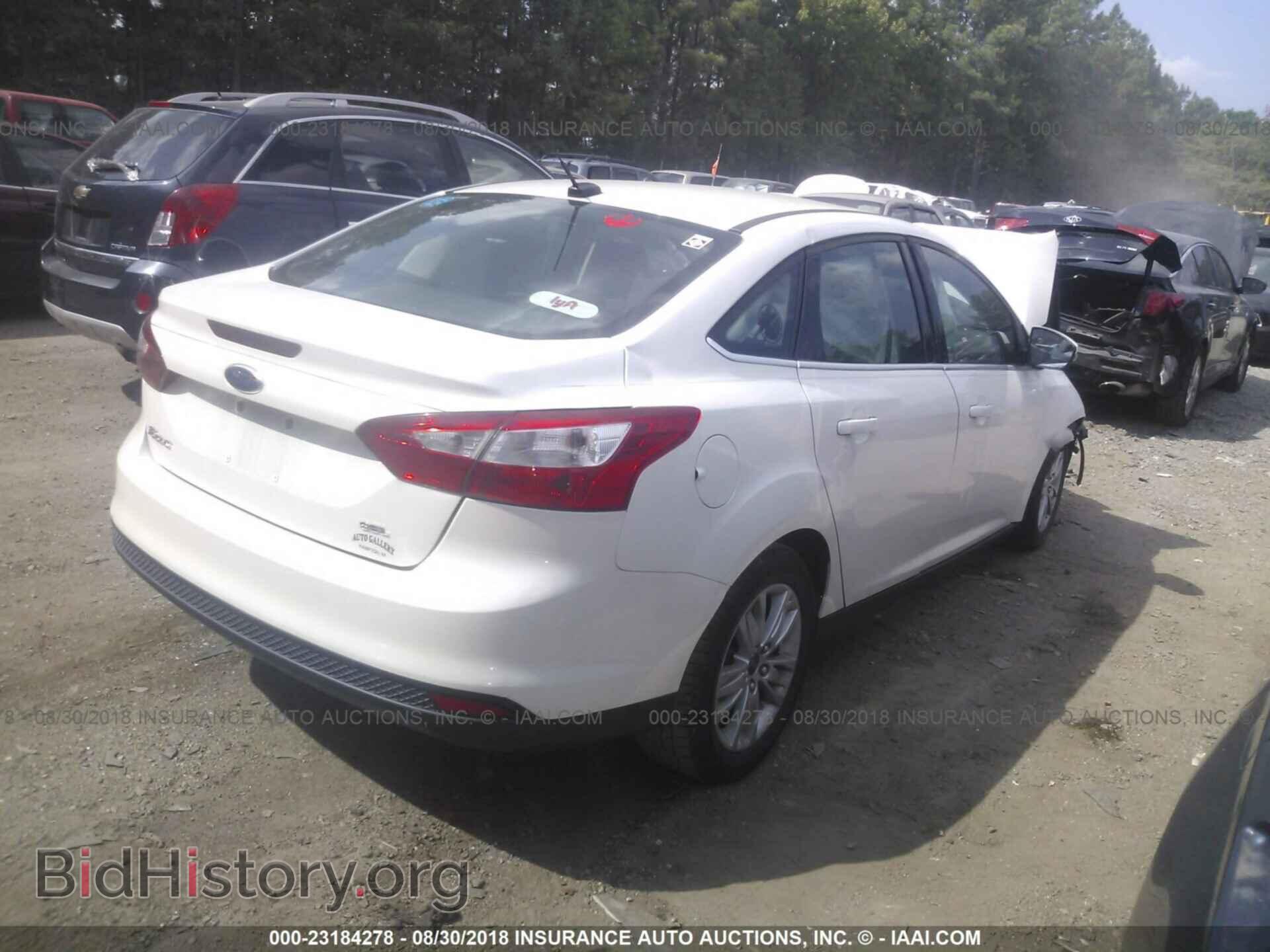 2012 Ford Focus - VIN: 1FAHP3H20CL230457 - Фото 4