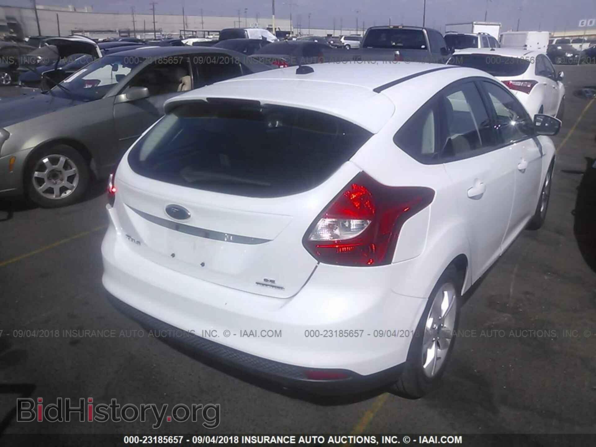 2014 Ford Focus - VIN: 1FADP3K29EL153114 - Photo 4