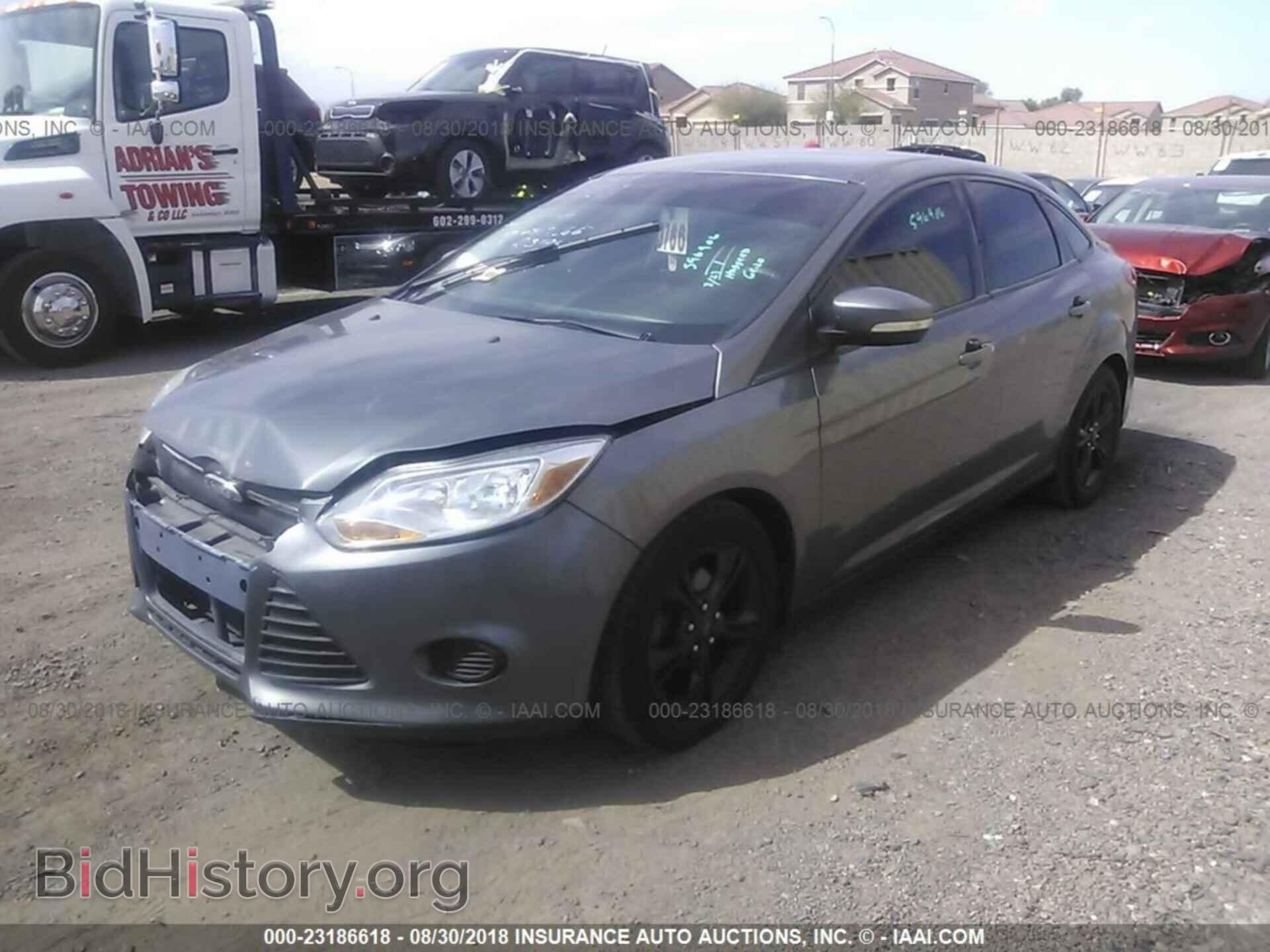 2014 Ford Focus - VIN: 1FADP3F29EL319366 - Фото 2