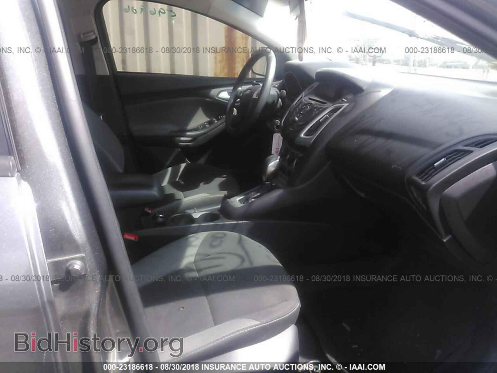 2014 Ford Focus - VIN: 1FADP3F29EL319366 - Фото 5
