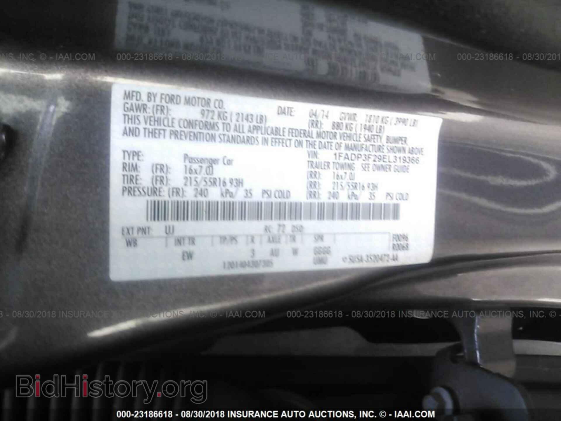 2014 Ford Focus - VIN: 1FADP3F29EL319366 - Фото 9
