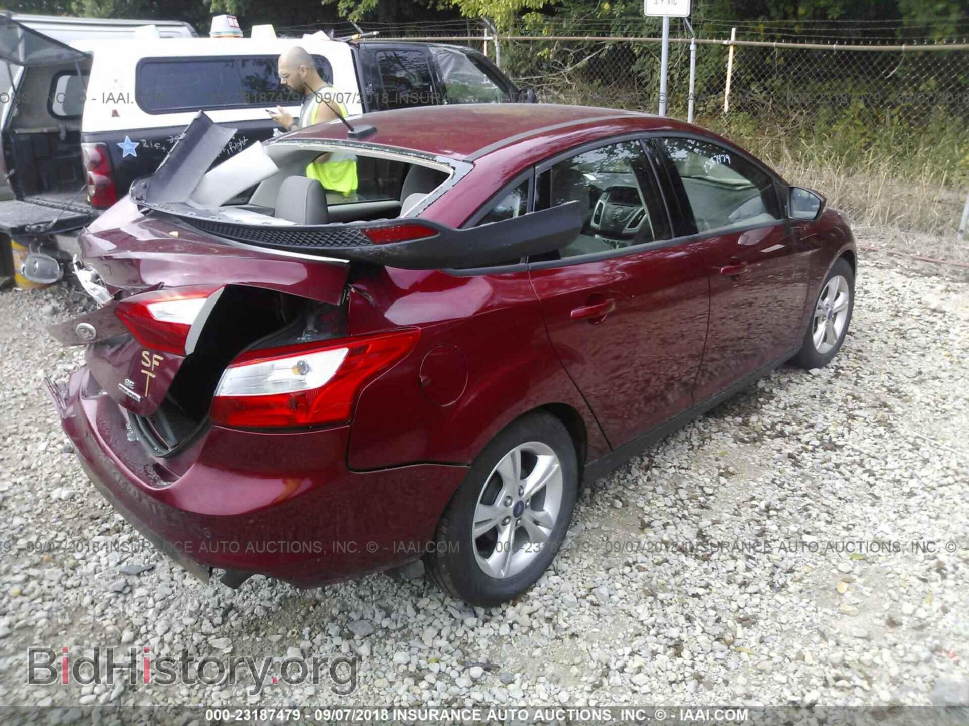 2014 Ford Focus - VIN: 1FADP3F25EL106995 - Фото 4