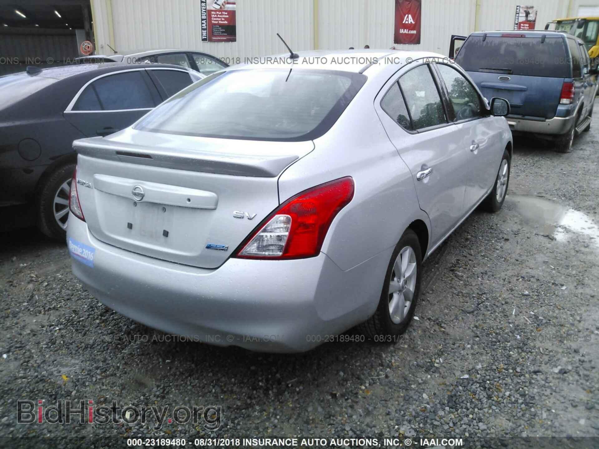 2014 Nissan Versa - VIN: 3N1CN7AP2EL844704 - Фото 4